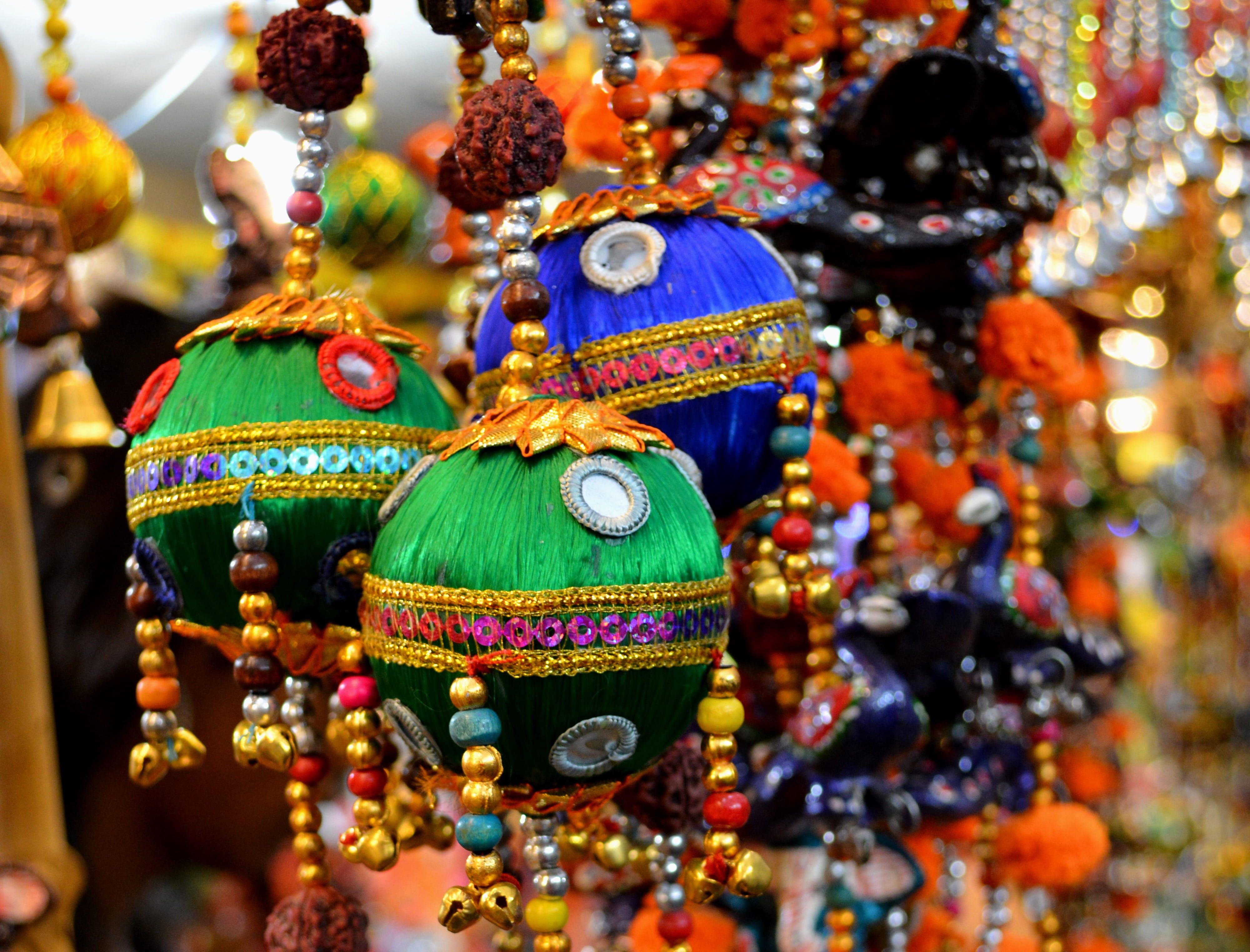 festival, green, retail, craft, two, close-up, diwali, selective focus, art and craft, creativity, orange, celebration, multi Colored, black, india, figurine, HD Wallpaper