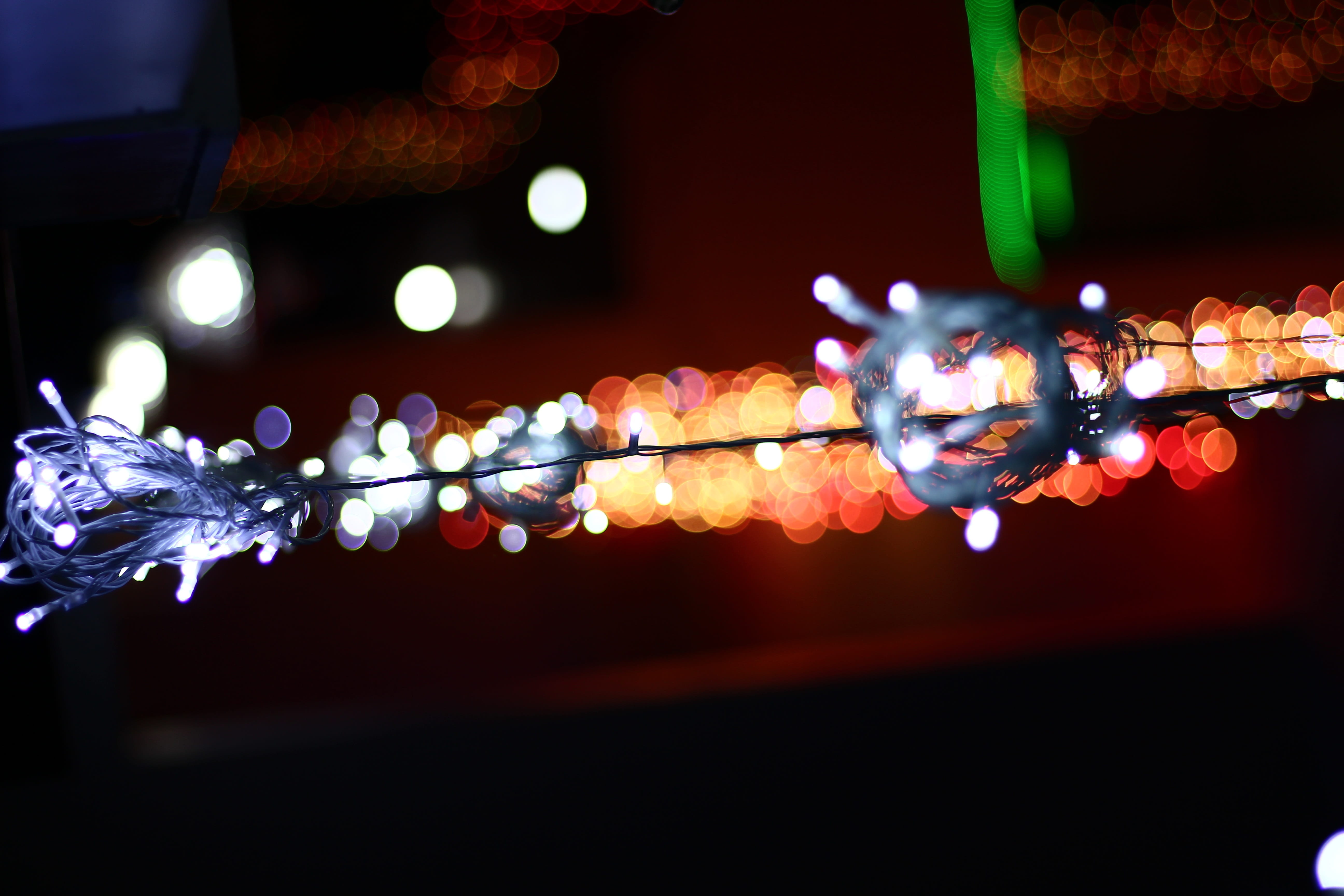 holiday, 5K, bright, lighting, string, black background, event, illuminated, turned, Night, prosperity, outdoors, light, nature, Bokeh, lights, christmas lights, HD Wallpaper