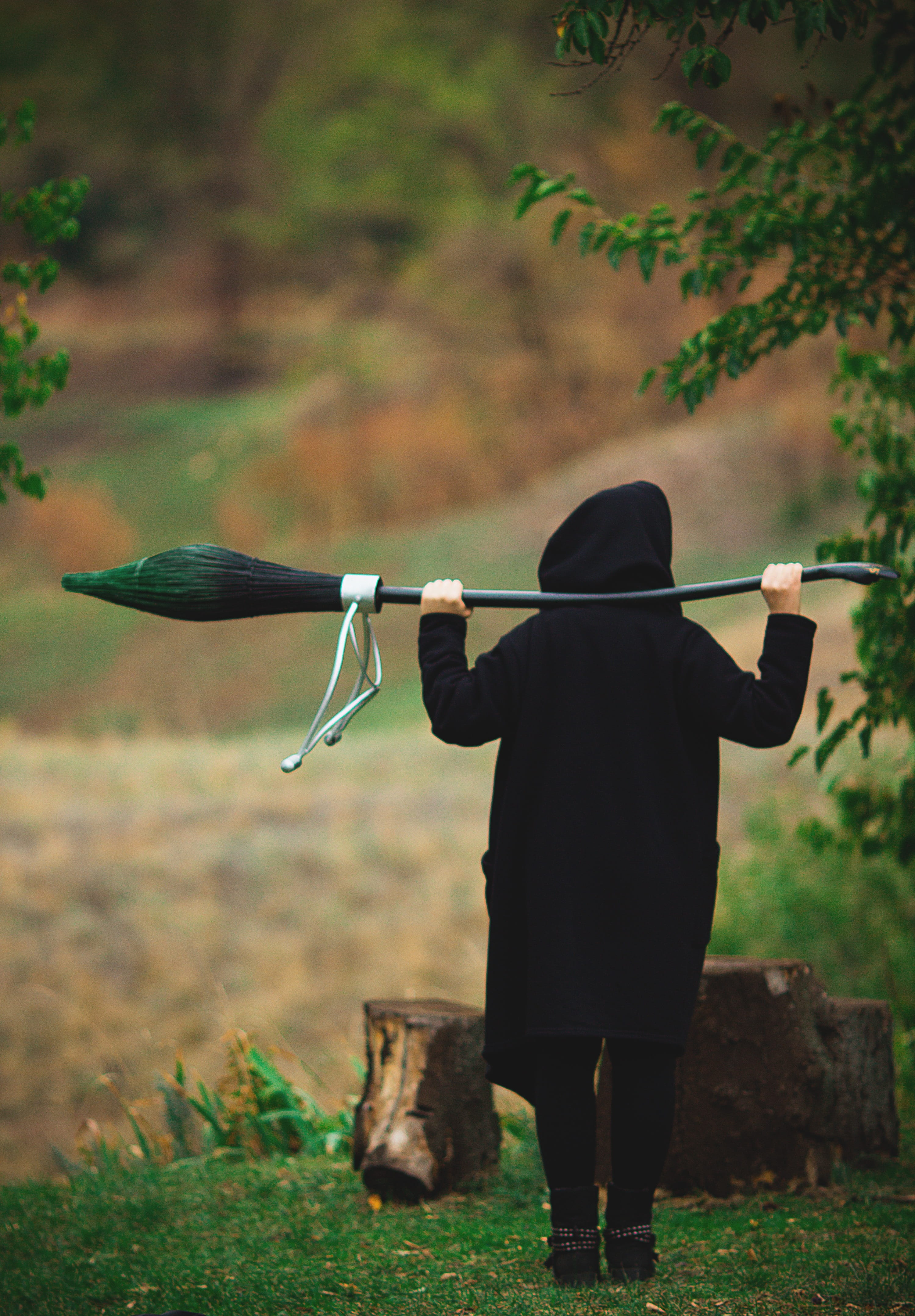 man, arms raised, outdoors, broom, grass, nimbus, travel, leisure activity, full length, holding, real people, people, vertebrate, one person, tree, dementor, Phone HD Wallpaper