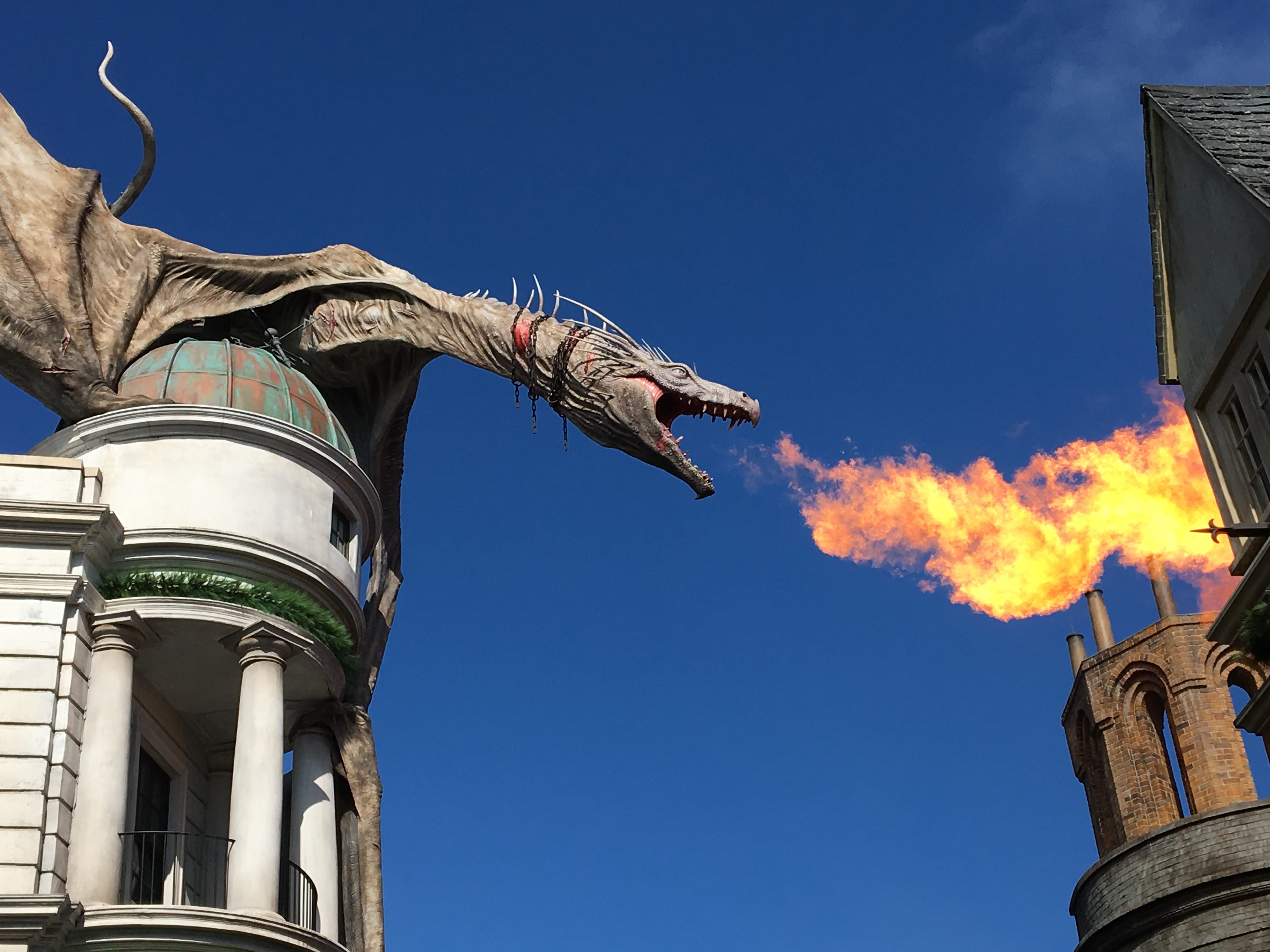 gringott, built structure, animal, fire - natural phenomenon, no people, representation, architecture, dragon, outdoors, day, animal themes, universal studios, HD Wallpaper