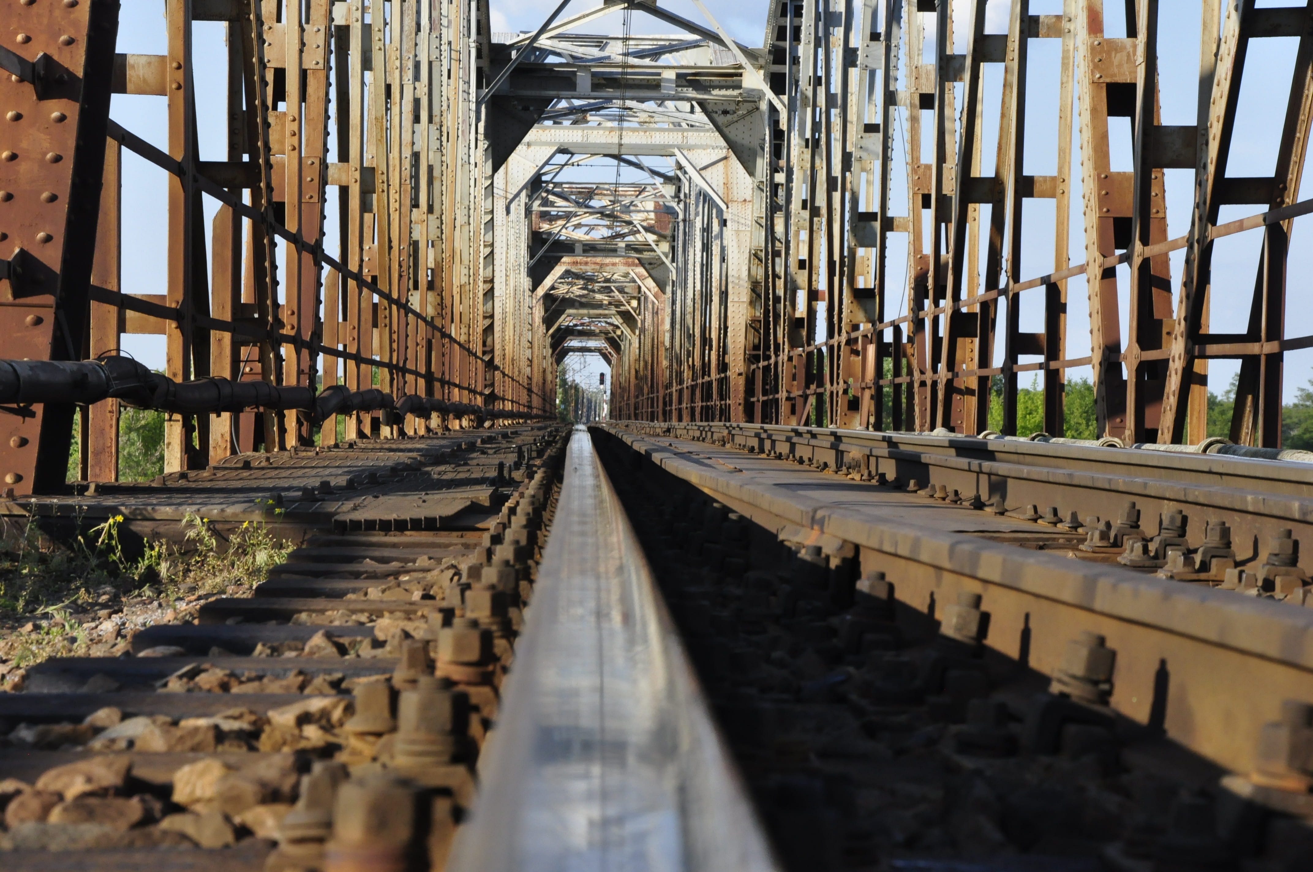 surface level, bridge - man made structure, vanishing point, outdoors, railing, railway bridge, communication, metal, rails, rail transportation, wood - material, HD Wallpaper