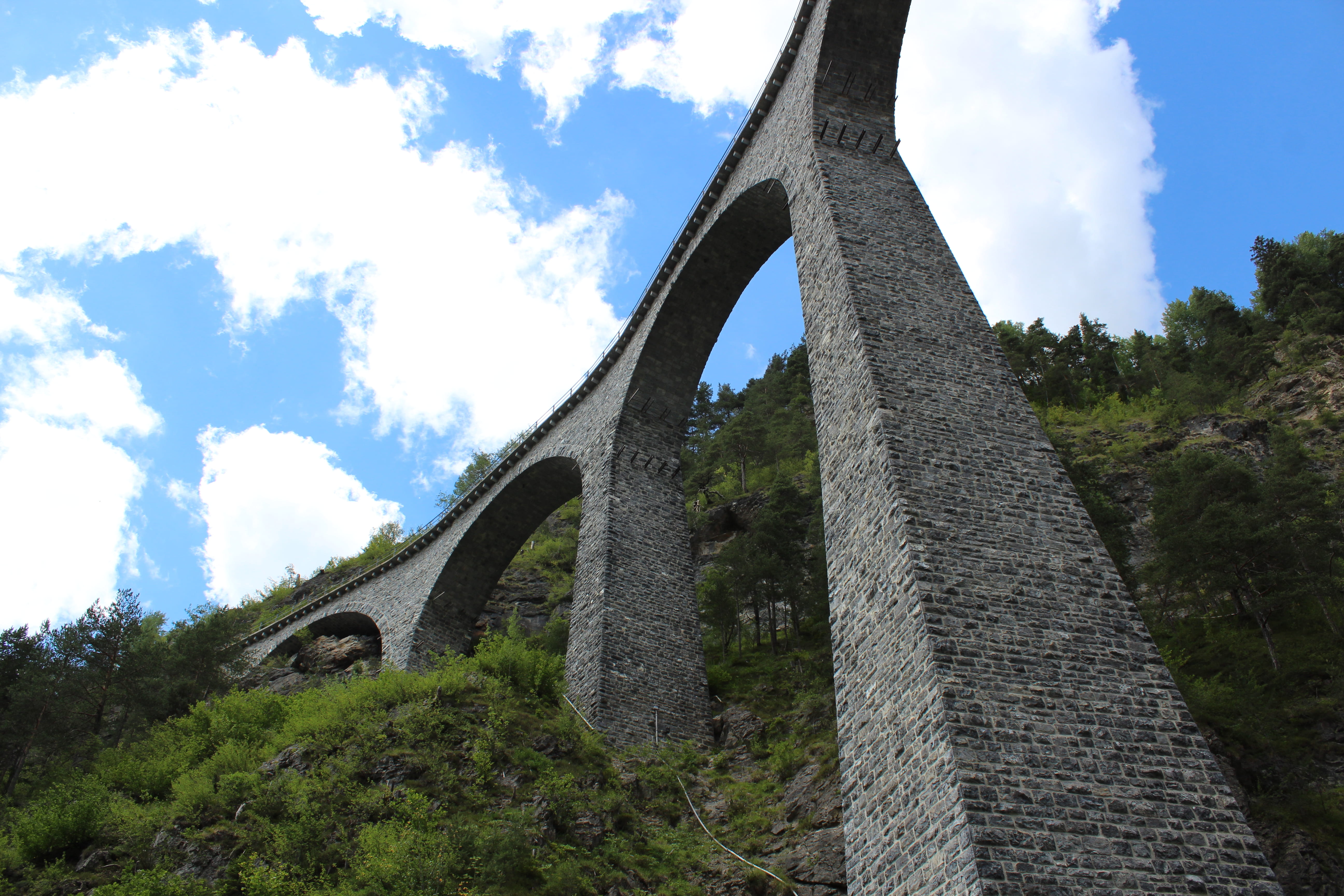 bridge, viaduct, day, landwasser viaduct, architecture, the past, low angle view, grison, 5K, no people, stone wall, built structure, switzerland, forest, HD Wallpaper