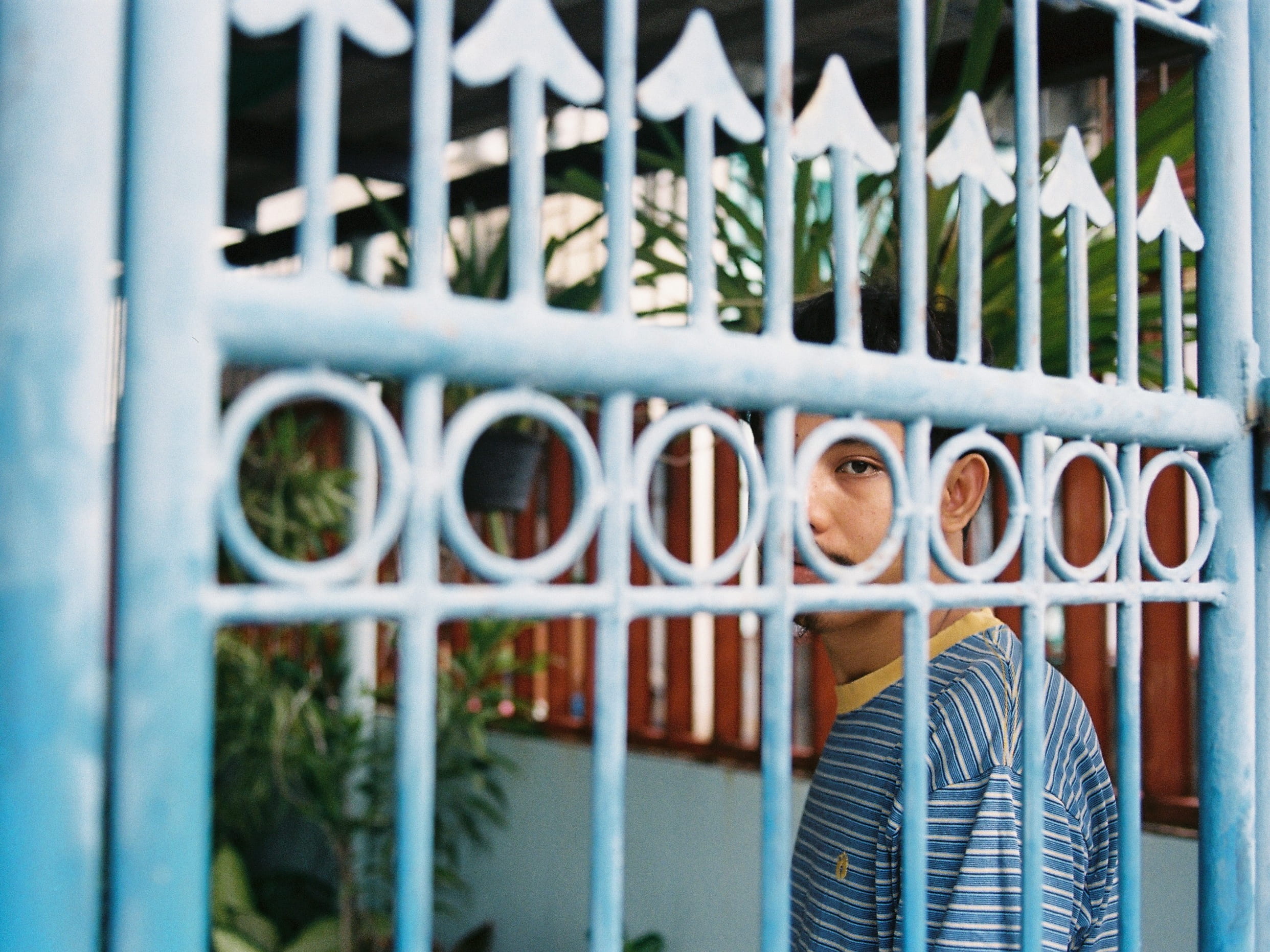 fence, feel, outdoors, real people, portrait, white, pattern, portra, kodak, text, one person, blue, casual clothing, metal, shirt, building exterior, security, HD Wallpaper