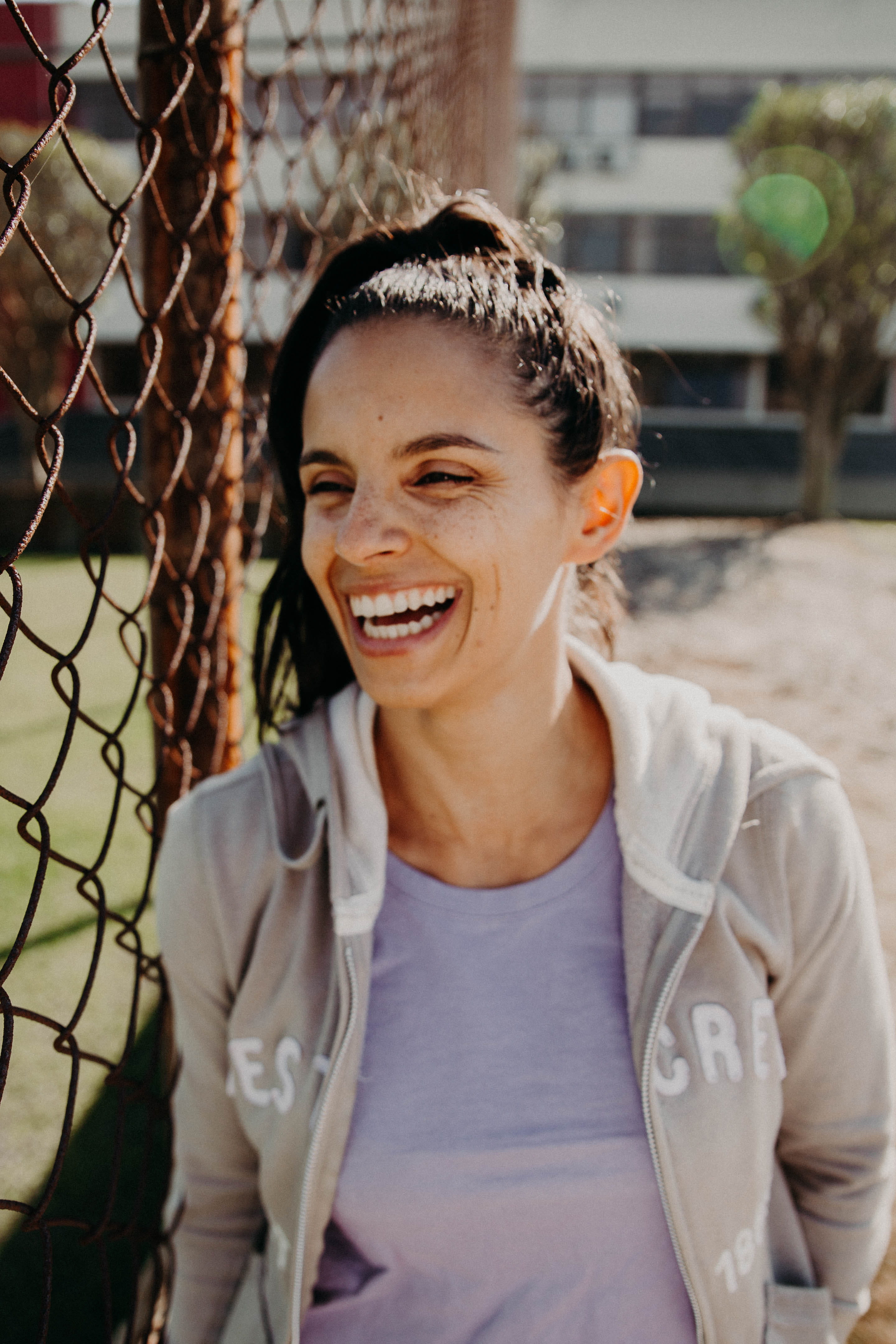 chain, 4K, standing, barrier, fashion, face, pullover, casual clothing, hairstyle, leisure activity, outdoors, day, hoodie, jacket, girl, toothy smile, Phone HD Wallpaper