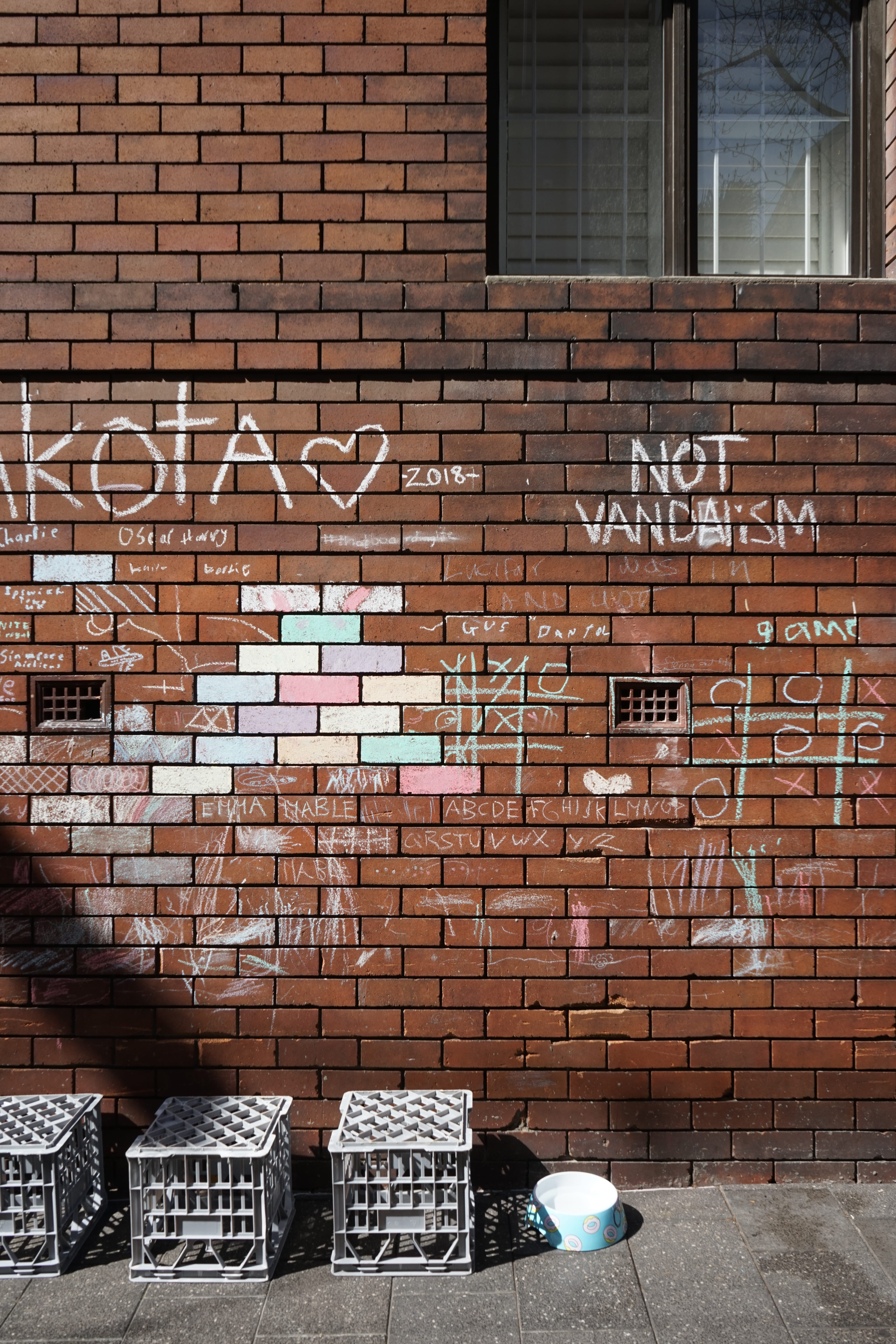 brick Wall, wall, crate, outdoors, fun, dog bowl, facade, city, plastic, noughts and cross, wall - Building Feature, no People, built Structure, backgrounds, Phone HD Wallpaper