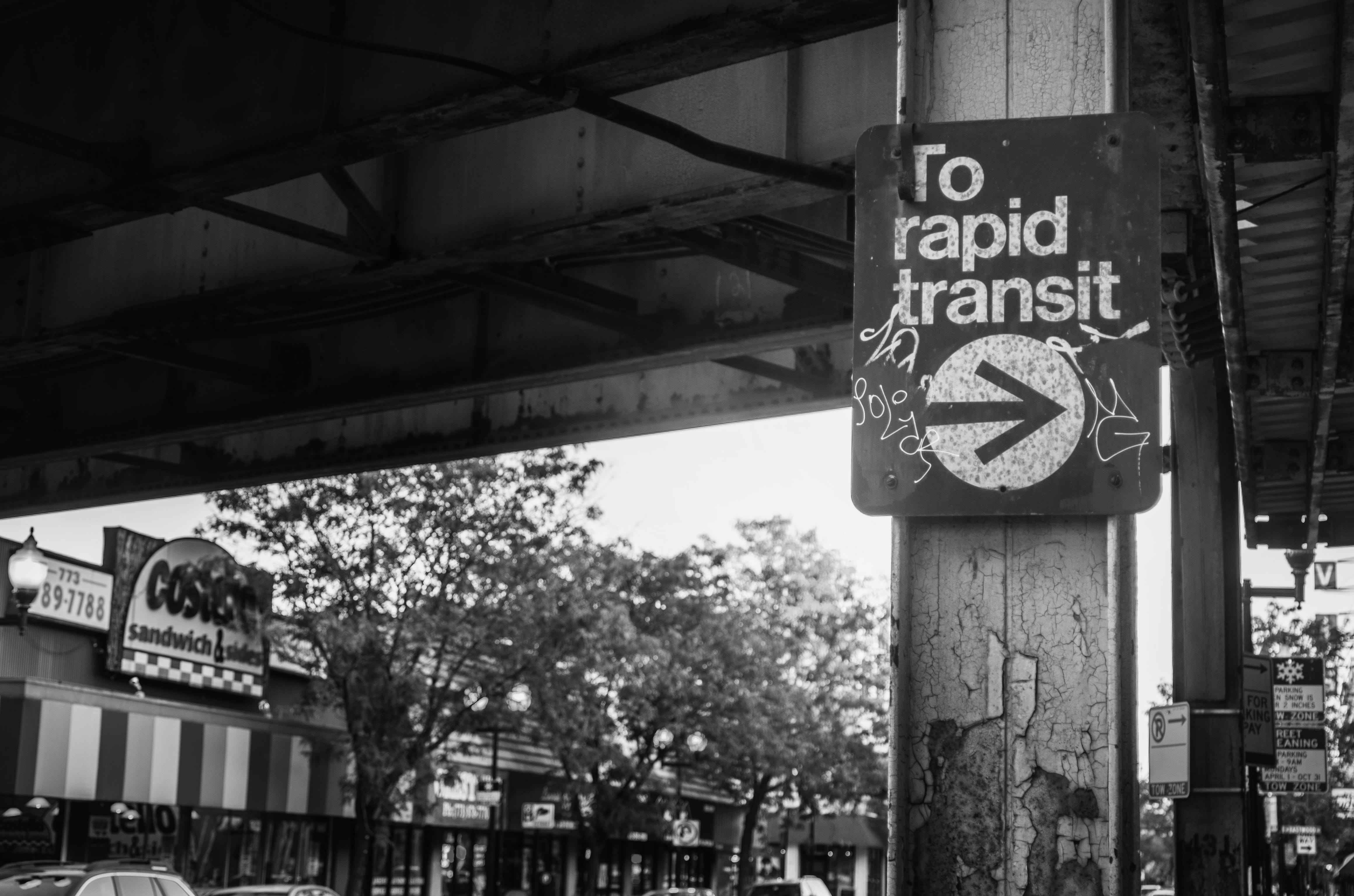road, pole, black and white, city, message, western script, arrow symbol, information, urban, sign, building exterior, non-western script, focus on foreground, HD Wallpaper