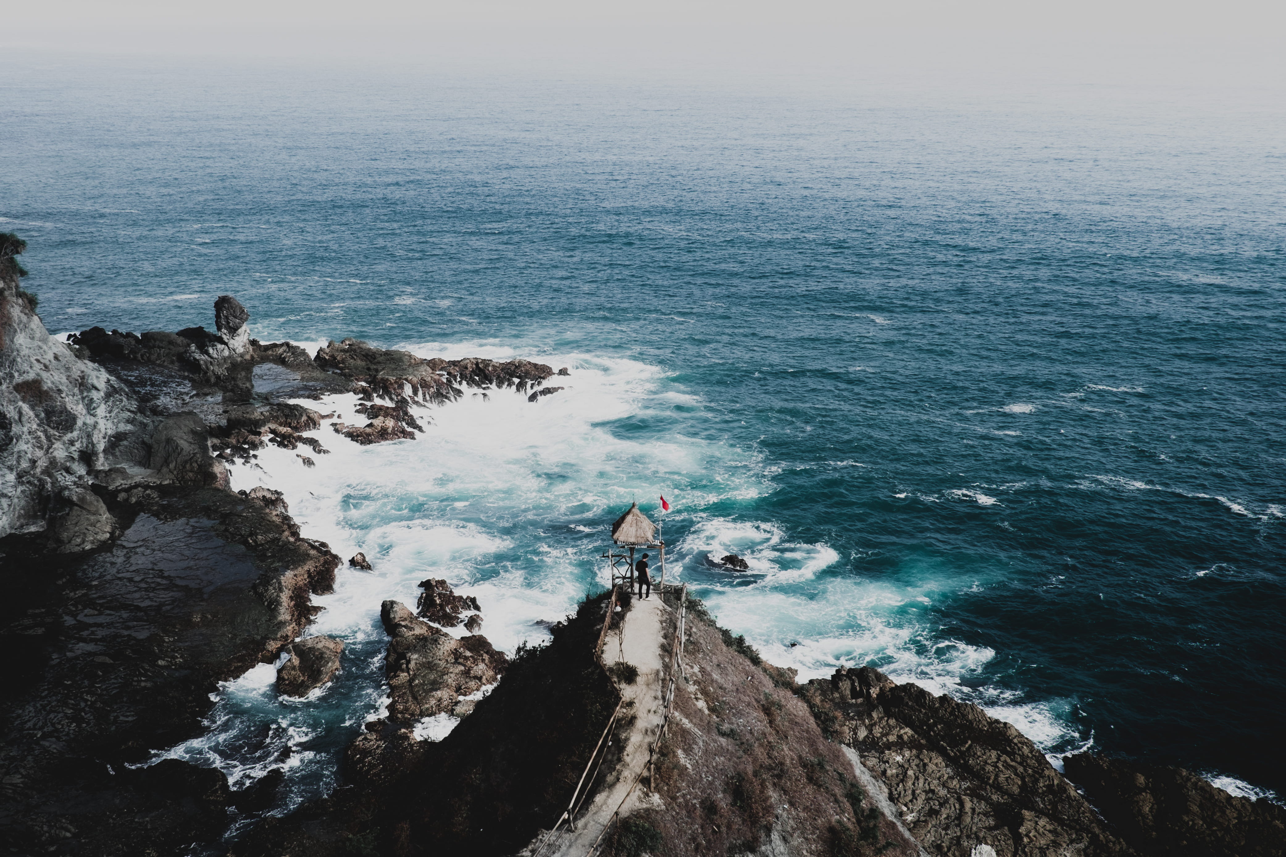 person, ocean, coast, tranquility, java, beauty in nature, blue, horizon over water, south sea, water, 4K, photography, sea, idyllic, day, rock, wave, HD Wallpaper