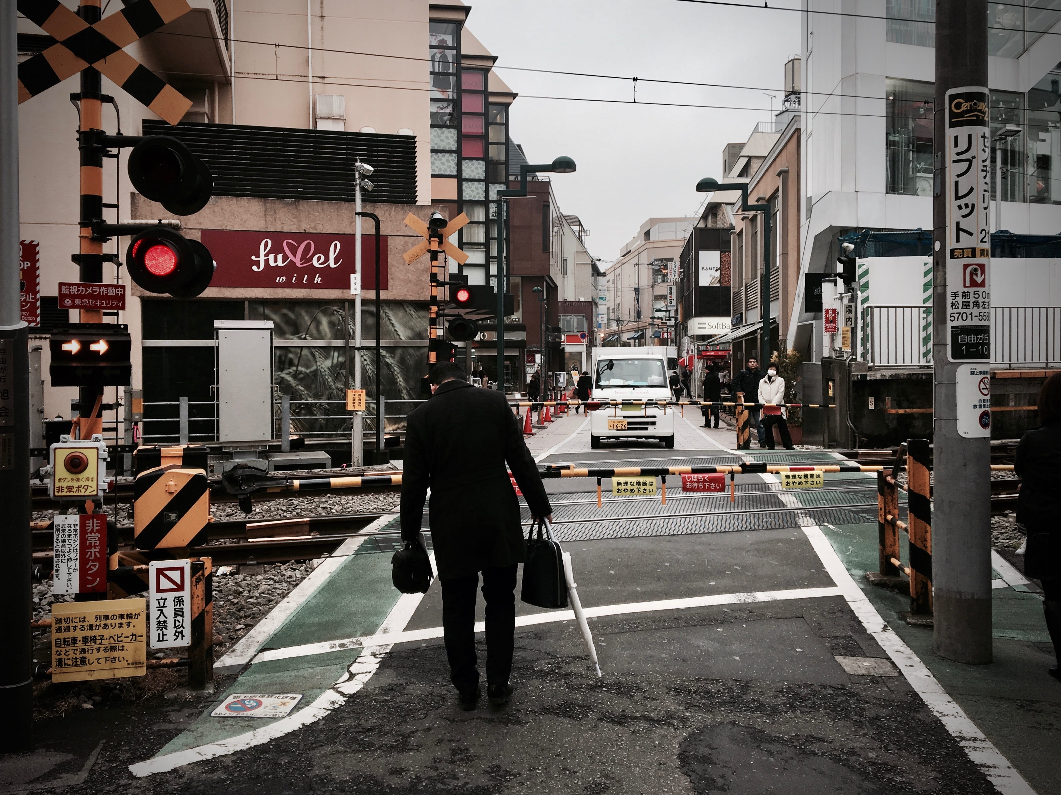 railroad crossing, japan, road sign, building exterior, day, train, built structure, road, street, text, real people, city street, level crossing, local, HD Wallpaper
