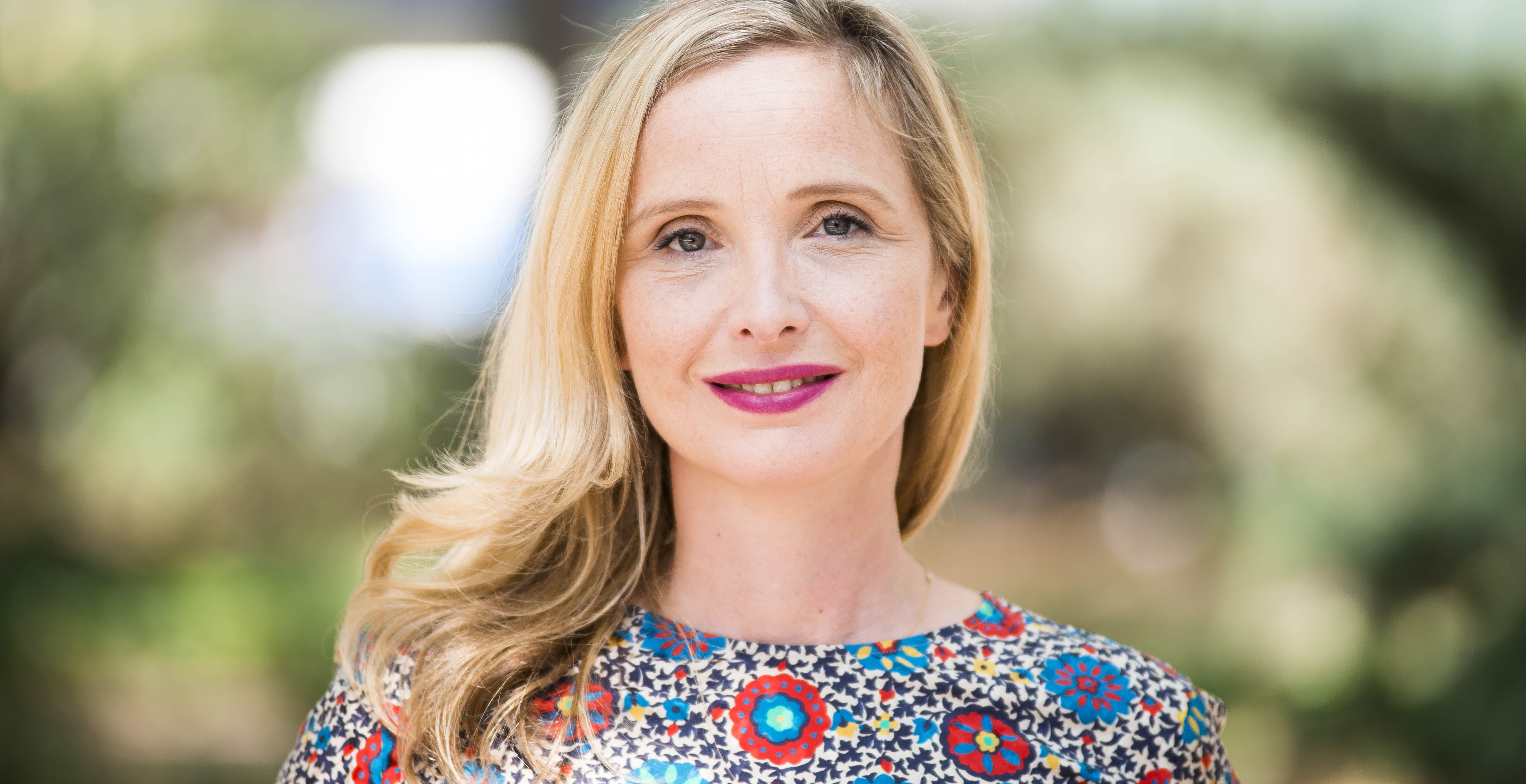 blonde, contemplation, beautiful woman, floral pattern, Julie Delpy, mature adult, 5K, pink lipstick, looking at camera, long hair, beauty, blond hair, HD Wallpaper