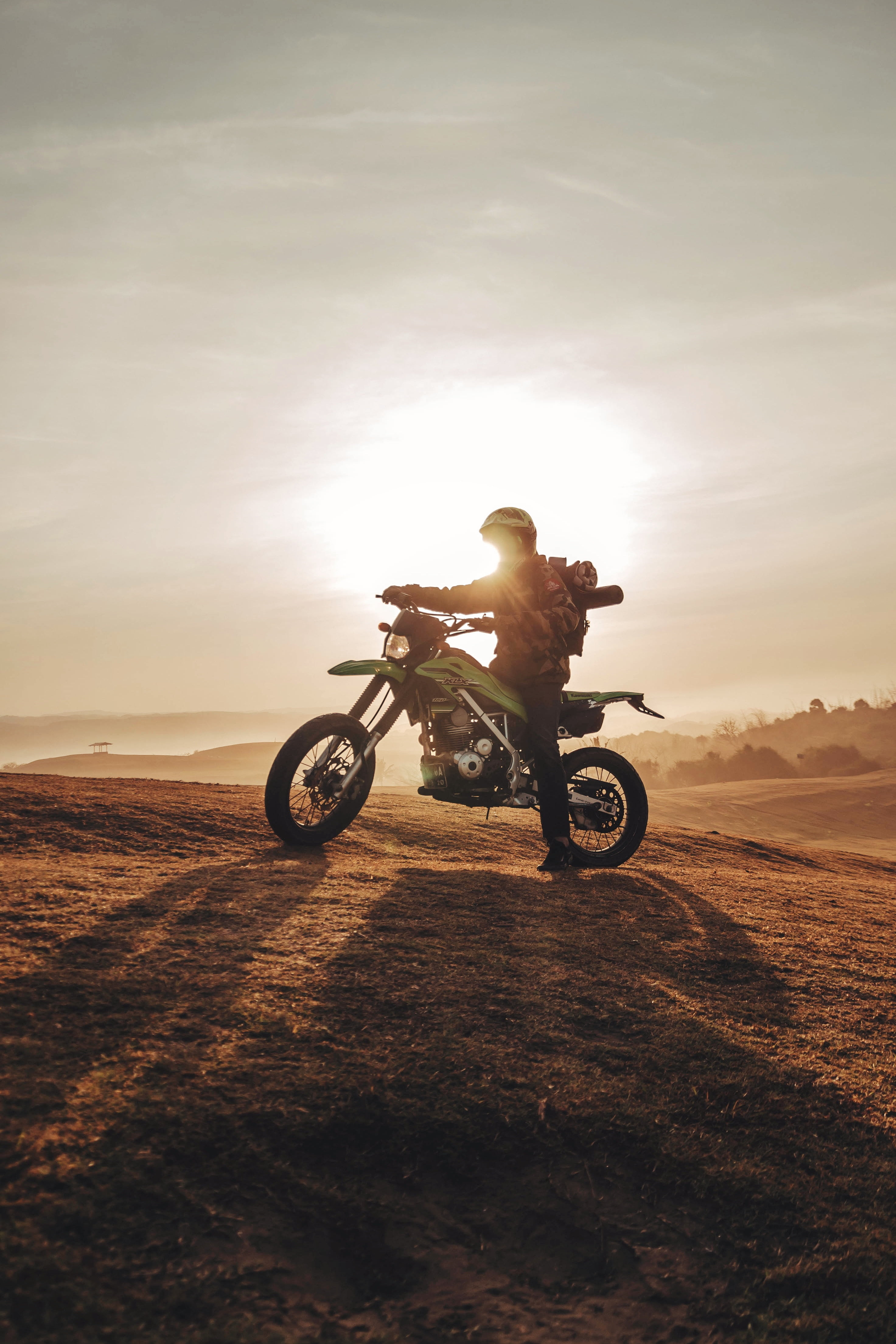 sports helmet, freedom, outdoors, dawn, lens flare, skill, nature, leisure activity, riding, ride, full length, crash helmet, men, helmet, transportation, Phone HD Wallpaper