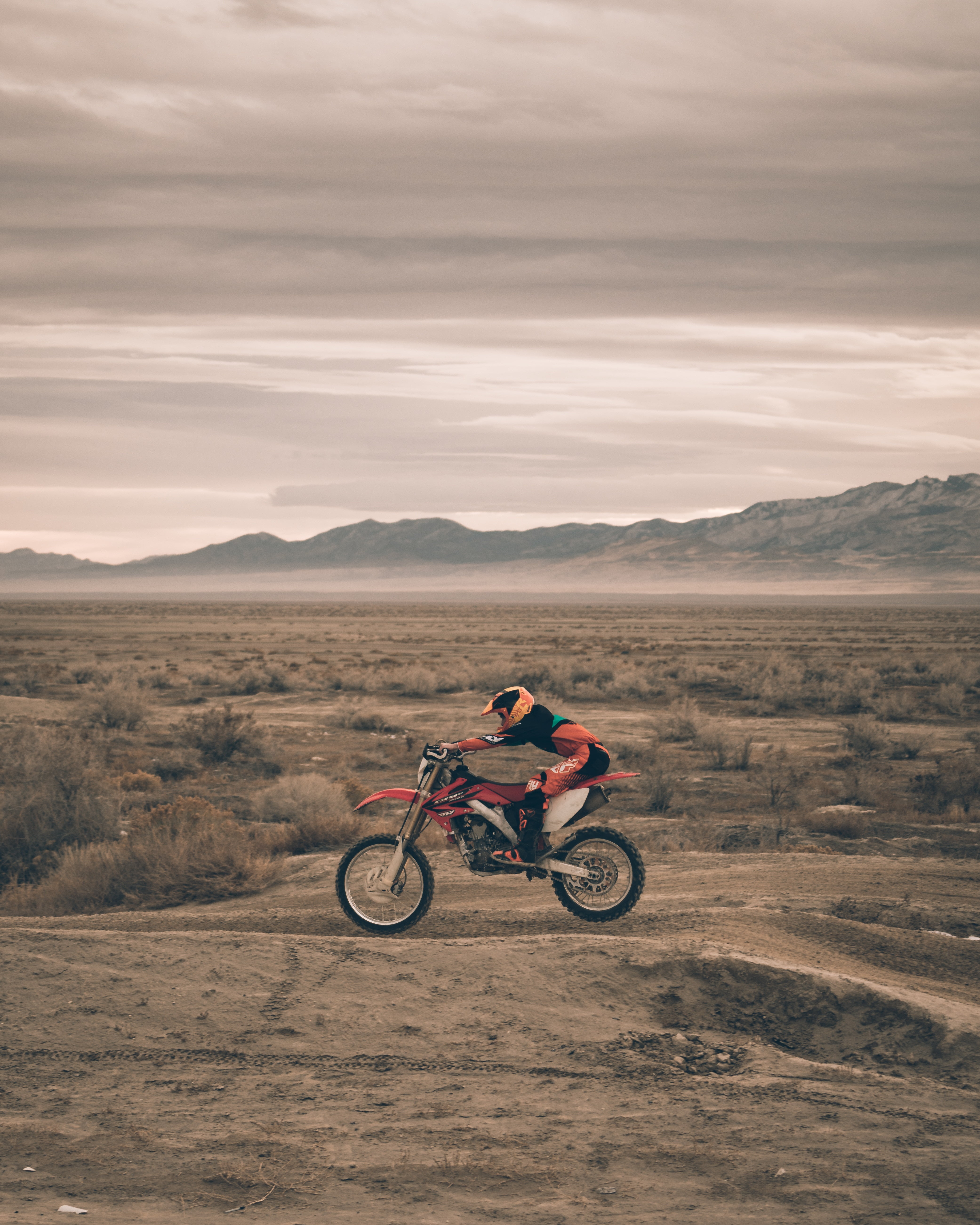 climate, cloud - sky, landscape, outdoors, sand, orange, bike, beauty in nature, dirt, motorcyclist, desert, transportation, motocross, mountain, day, 5K, Phone HD Wallpaper