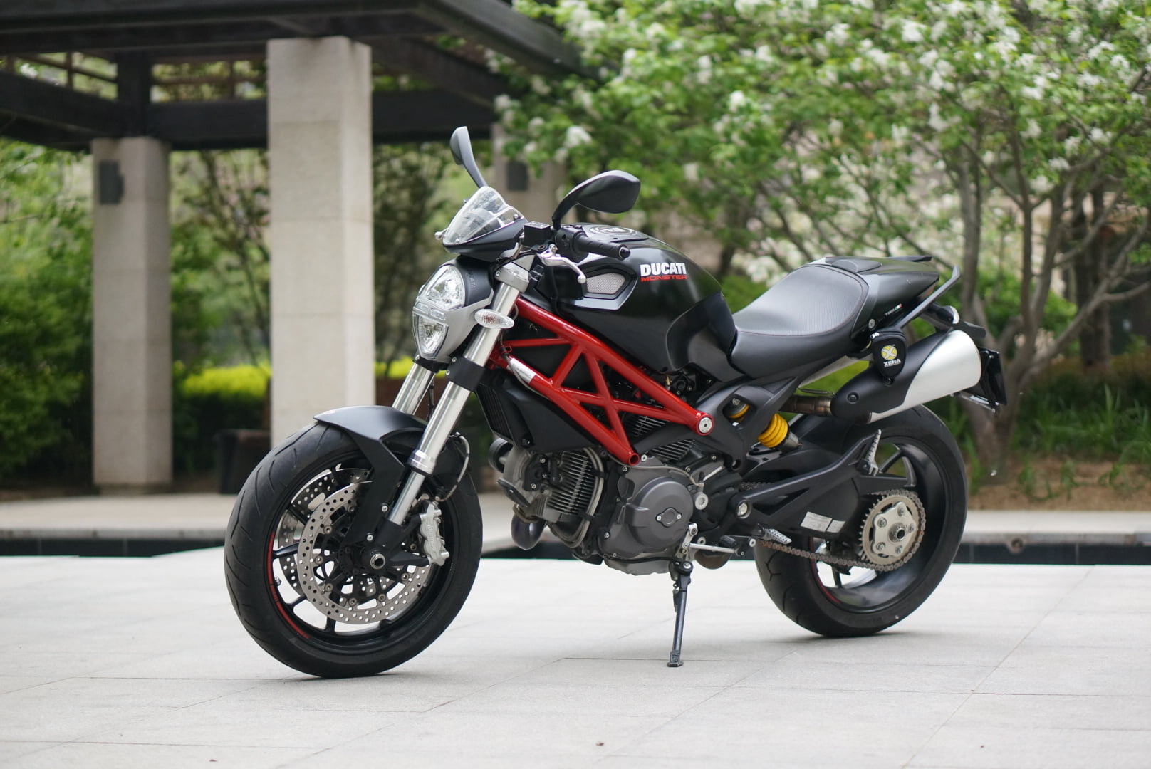 nature, scooter, land vehicle, focus on foreground, no people, wheel, motor scooter, Ducati Monster 796, parking, city, day, motorcycle, black color, plant, HD Wallpaper