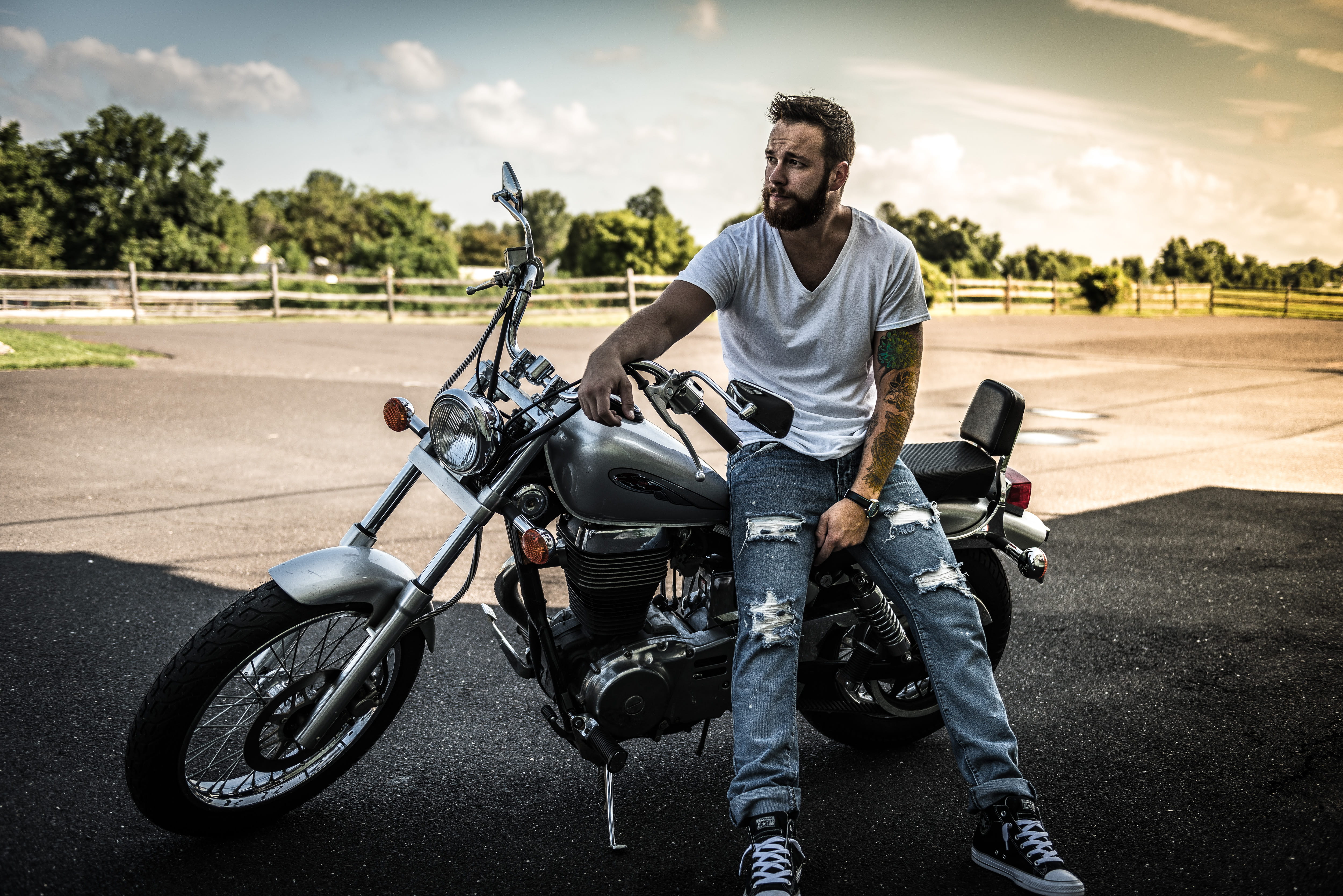 sky, men, young adult, cruiser, fence, sitting, single, black, tattoos, 4K, lifestyles, headwear, man, mode of transportation, motorcyclist, road, biker, HD Wallpaper