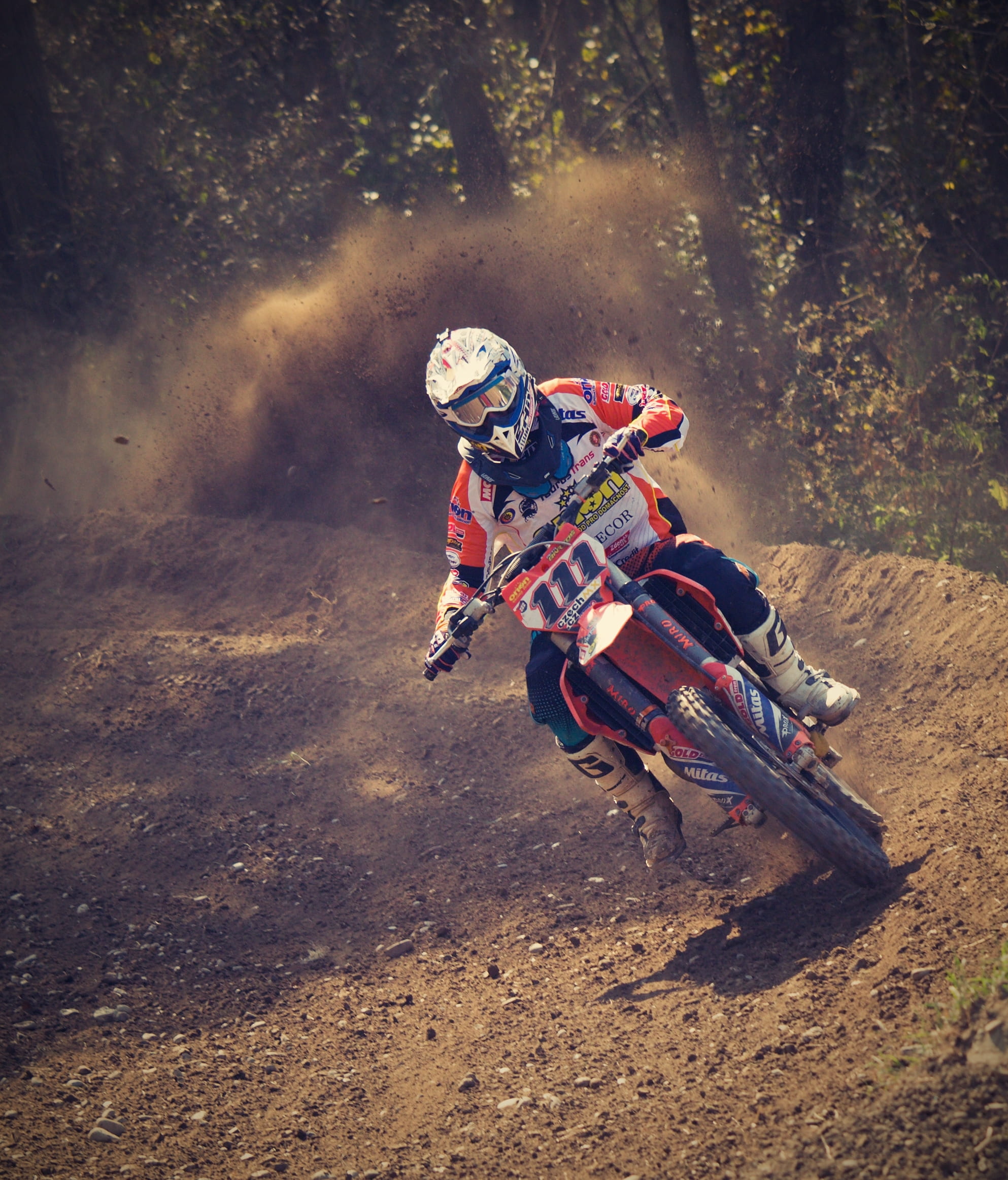 outdoors, men, real people, athlete, action, dust, trees, speed, dirt, transportation, wheel, vehicle, overall, nature, helmet, adult, person, daytime, Phone HD Wallpaper