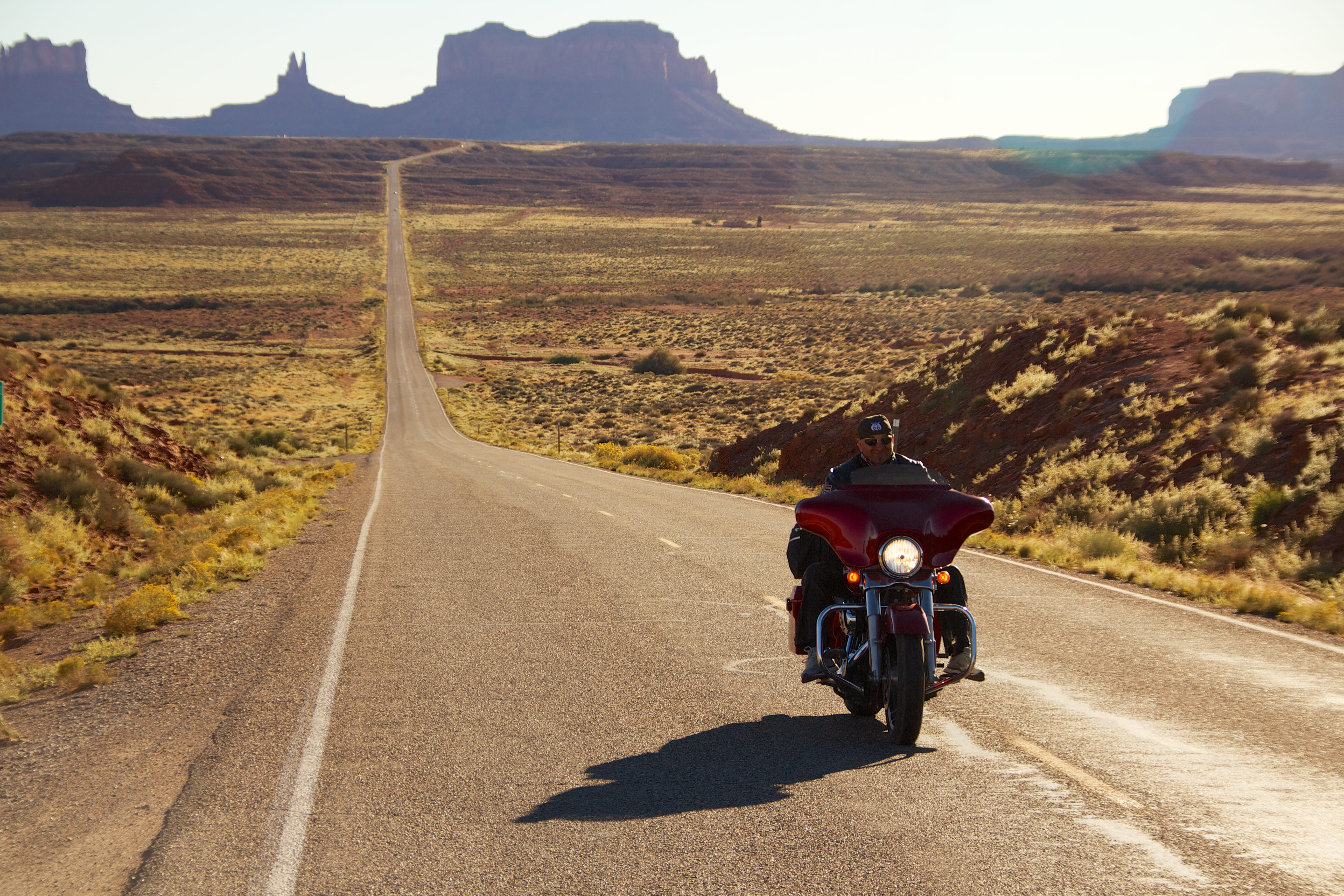 sunlight, day, harley davidson, red, daytime, direction, real people, travel, motorcycle, transportation, land vehicle, landscape, 5K, nature, monument valley, HD Wallpaper