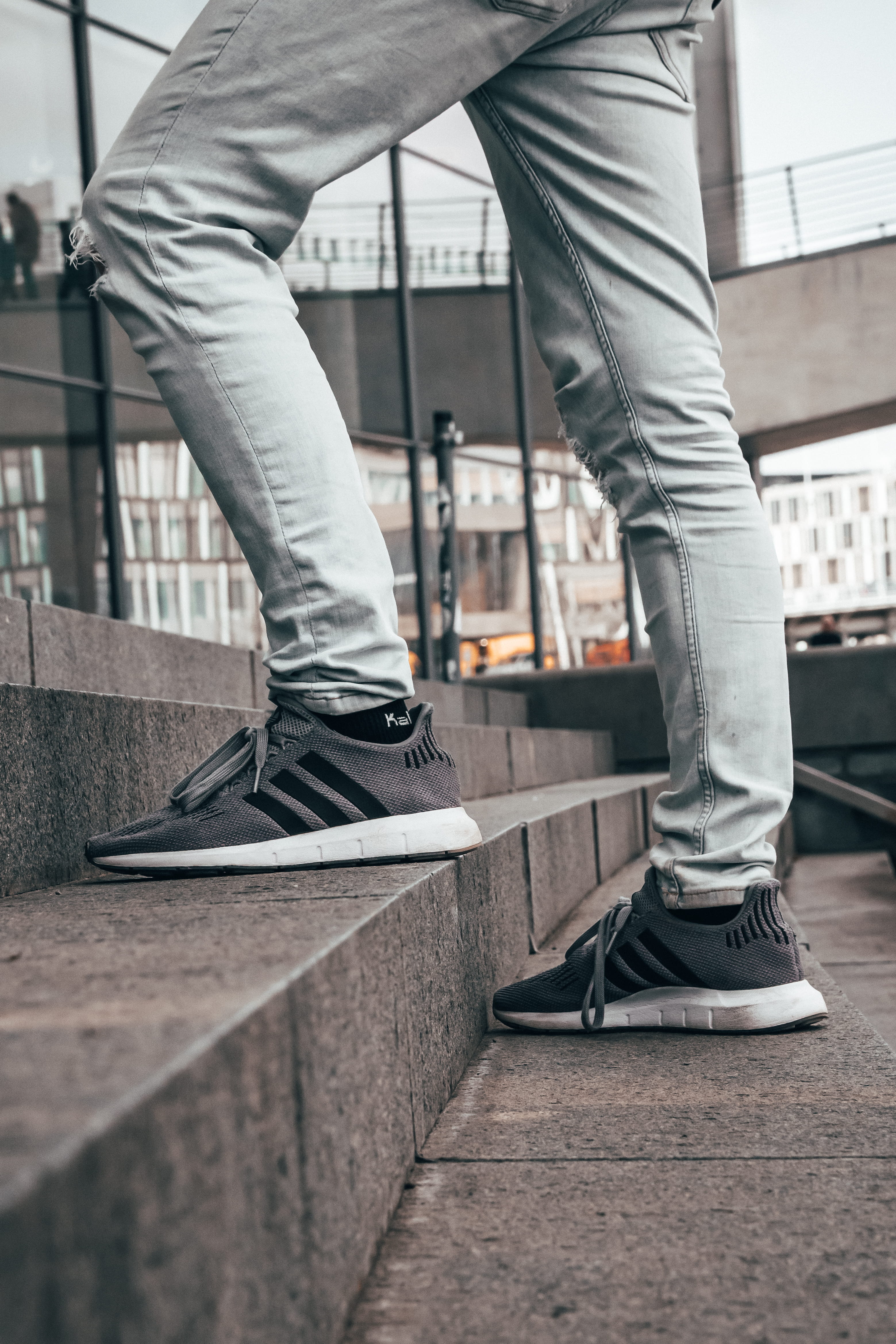 apparel, built structure, human, day, brick, standing, adidas, lifestyles, human limb, men, side view, sneaker, 4K, low section, outdoors, deutschland, Phone HD Wallpaper