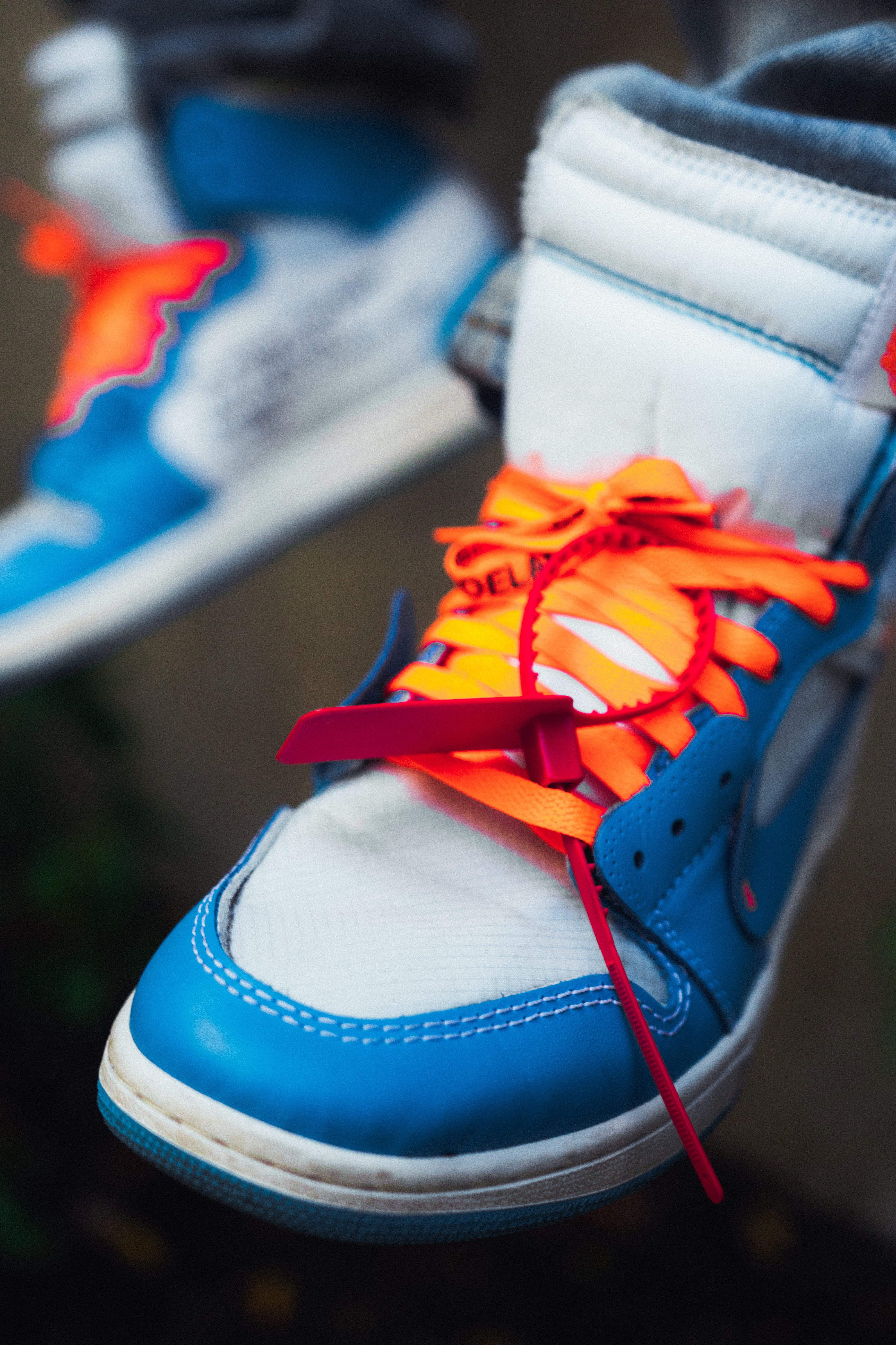 selective focus, red, shoelace, icing, still life, cake, shoes, ribbon, land, creme, clothing, clogs, sand, food, sport, sneaker, canvas, 5K, close-up, Phone HD Wallpaper