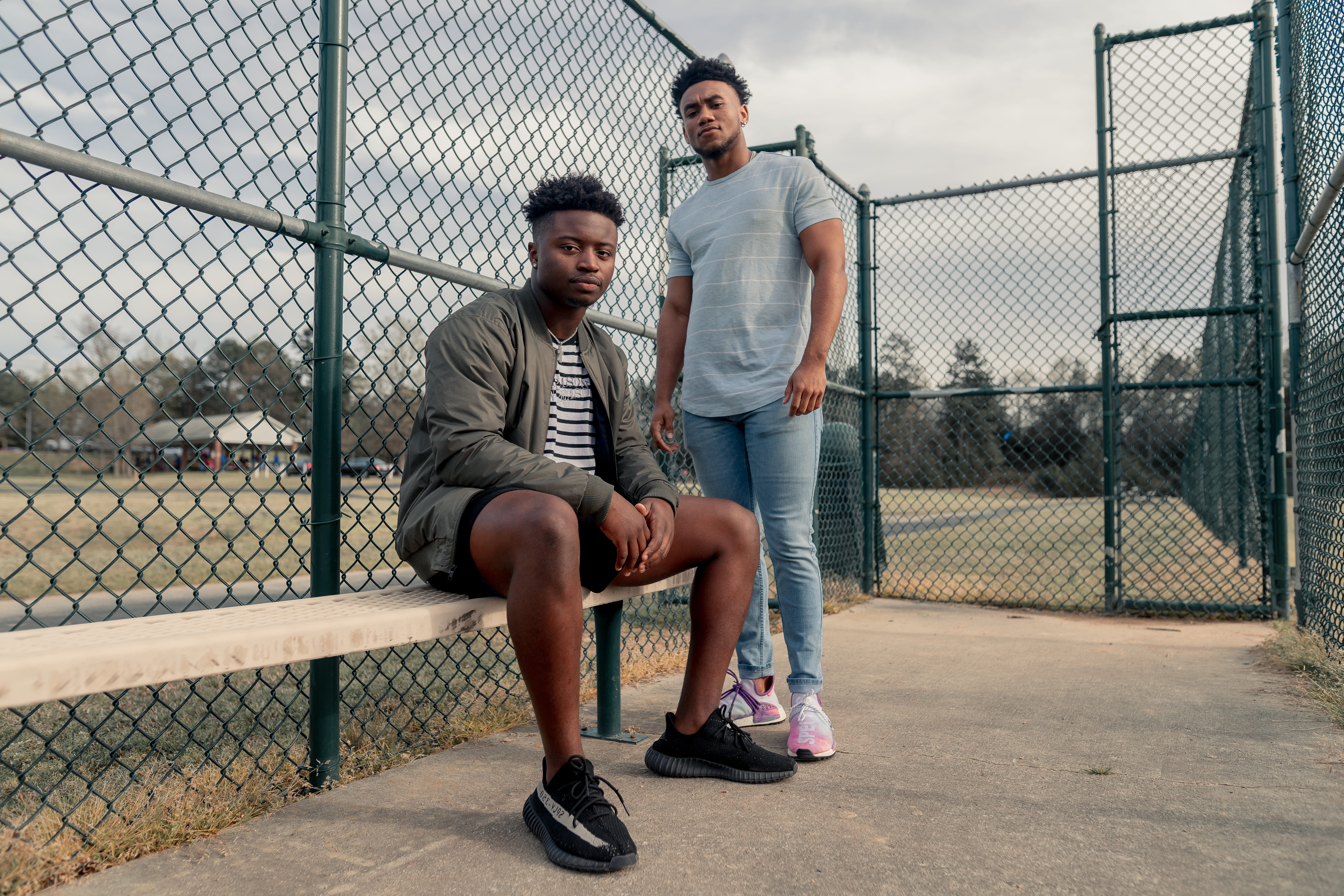 sitting, plywood, apparel, denim, leisure activity, person, two people, bench, full length, prison, adult, togetherness, footwear, shoe, day, park bench, HD Wallpaper