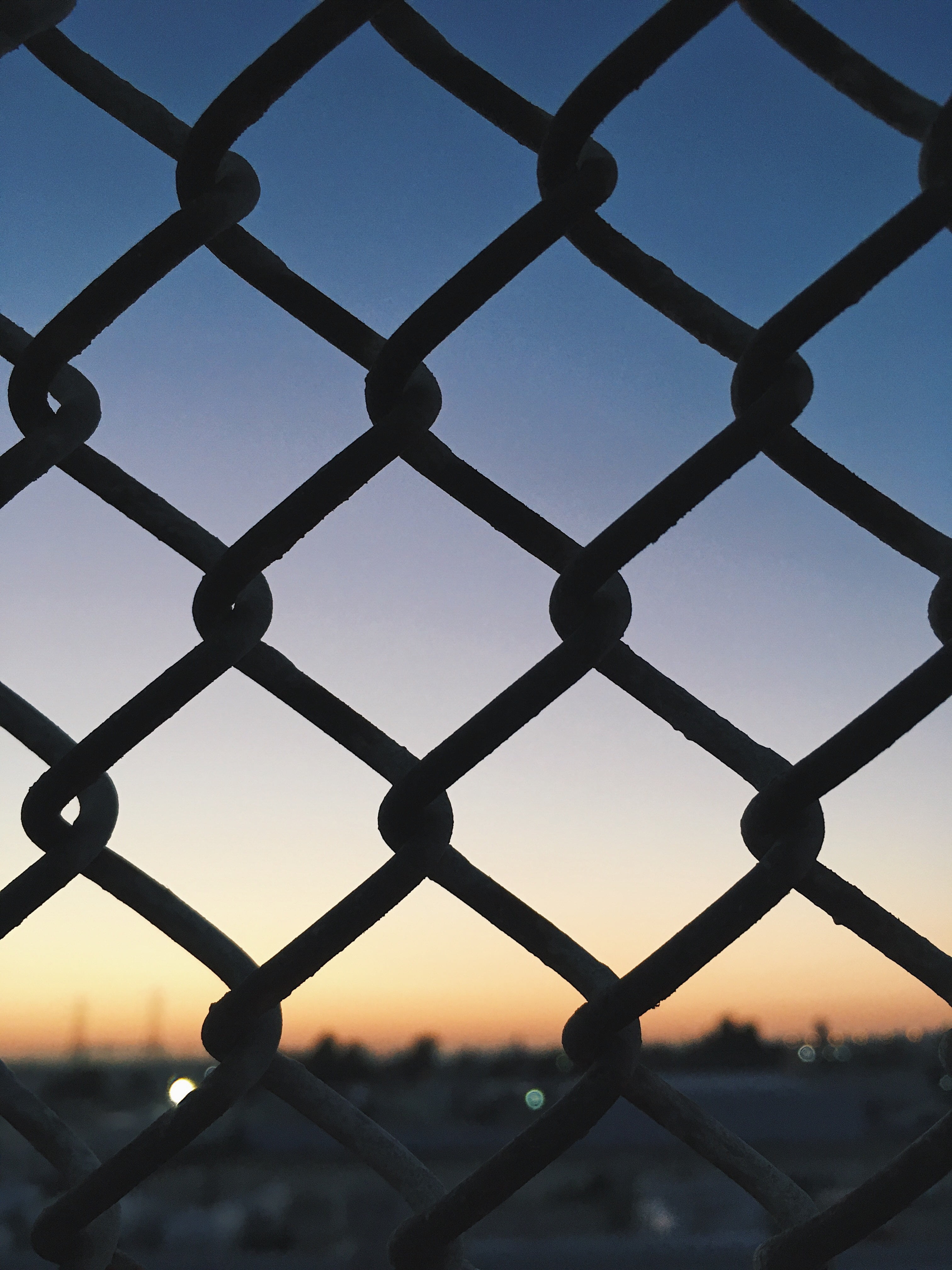 pattern, barrier, protection, chain, fence, sky, outdoors, chainlink fence, focus on foreground, backgrounds, boundary, no people, 4K, grid, dark, security, Phone HD Wallpaper