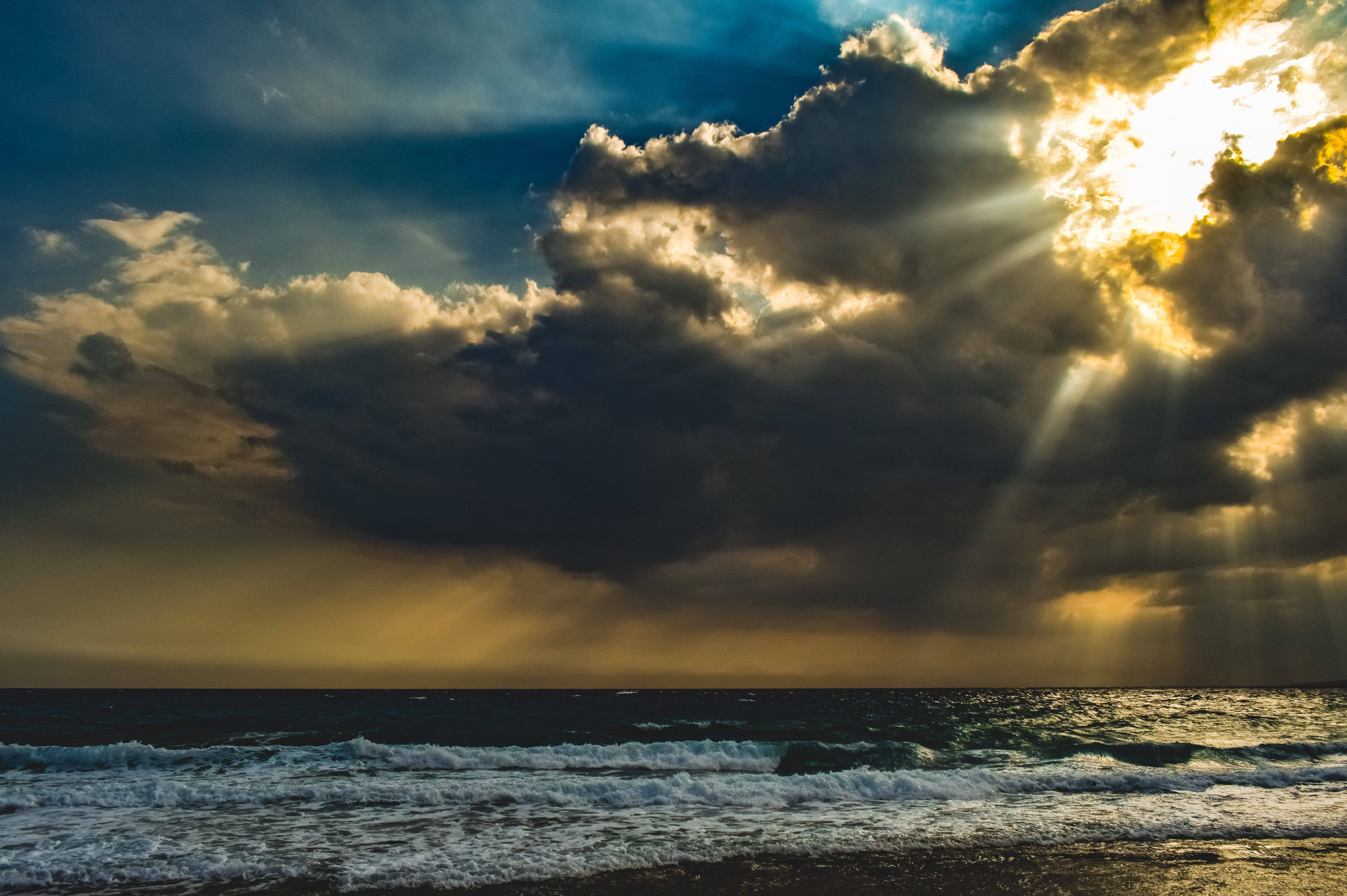 sunbeam, storm, power in nature, sunlight, water, nature, outdoors, weather, horizon over water, overcast, climate, stormy, no people, horizon, tranquility, HD Wallpaper