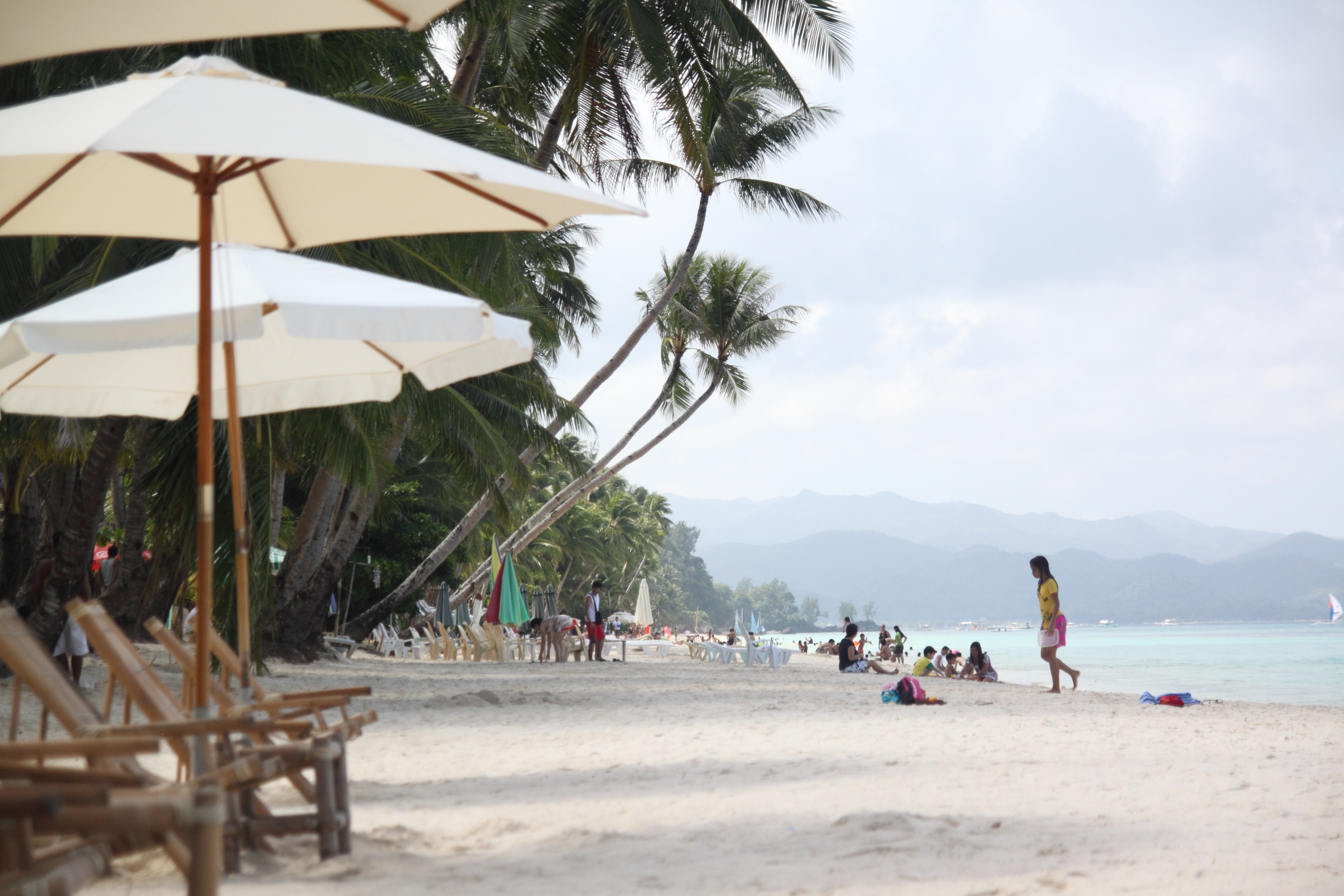 umbrella, holiday, real people, group of people, protection, water, tree, plant, boracay beach, lifestyles, sky, land, outdoors, sand, nature, palm tree, HD Wallpaper
