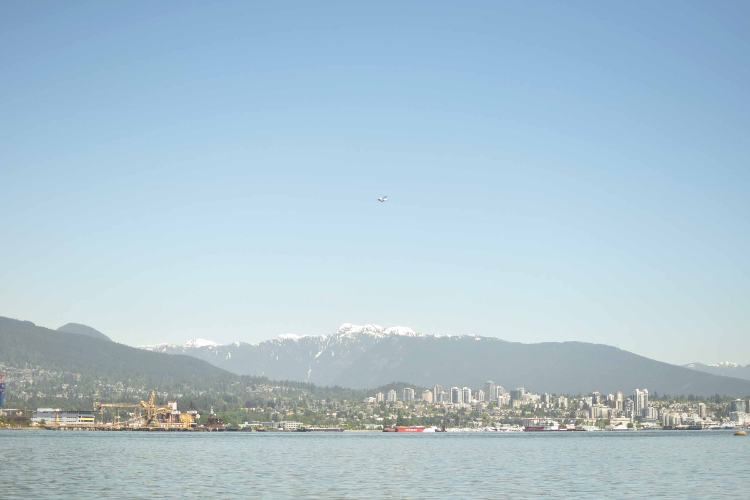 water, flying, seawall, mountains, outdoors, stanley park, sea, big city, boats, city, nature, mode of transportation, mountain range, built structure, HD Wallpaper