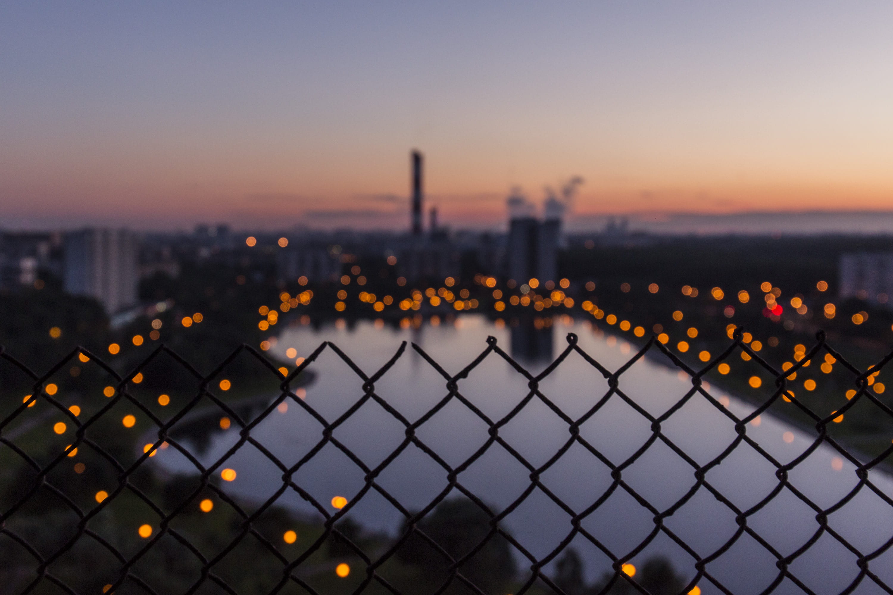 cyclone, wire, safety, cityscape, no people, chain, sky, security, sunset, dusk, shallow, city life, selective, urban skyline, pond, scapes, illuminated, HD Wallpaper