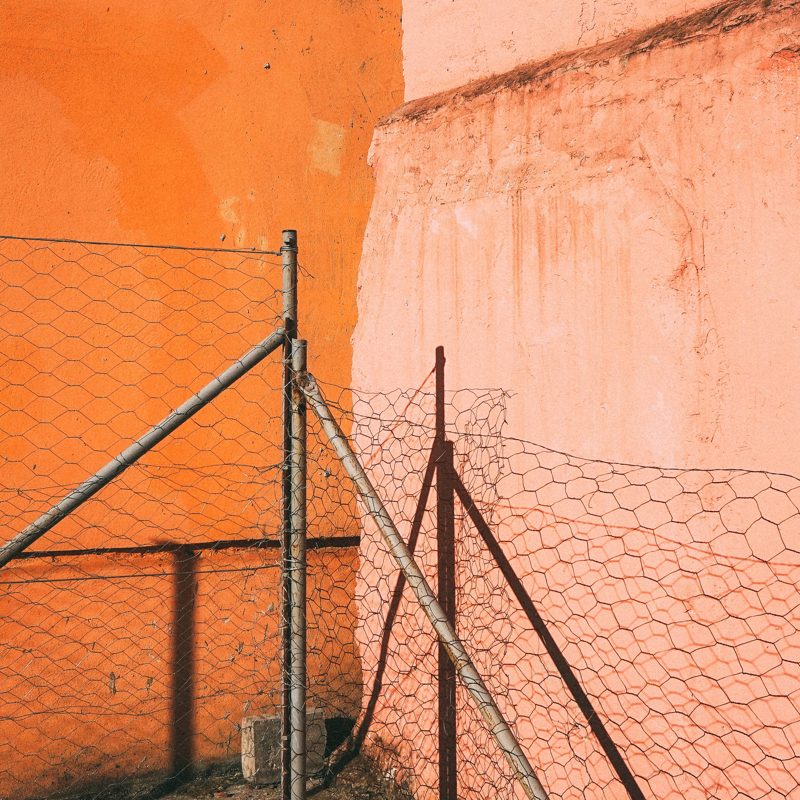 built structure, building exterior, metal, 2K, building, orange, orange color, outdoors, barbed, architecture, connection, cyclone, power supply, day, Phone HD Wallpaper