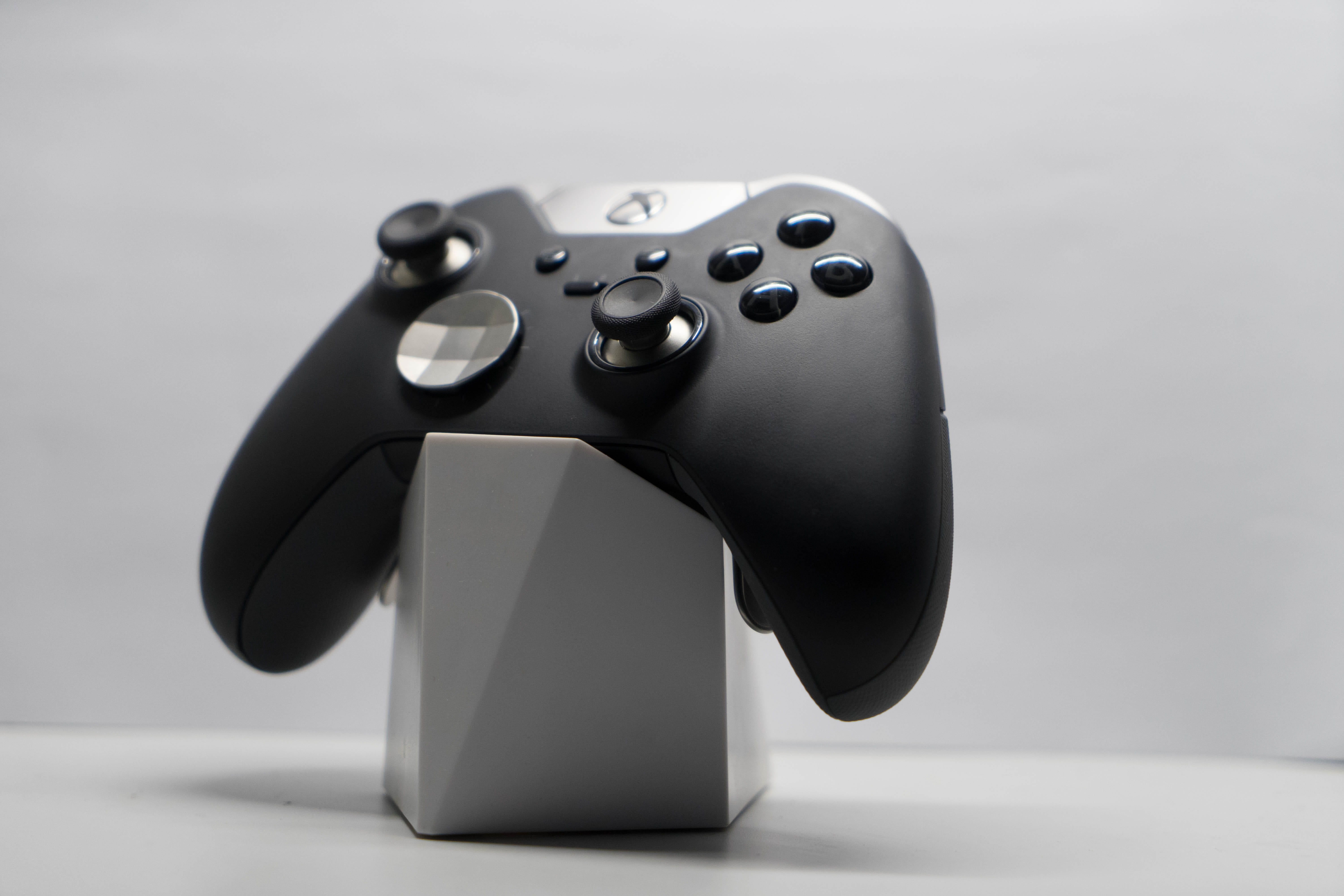 focus on foreground, studio shot, still life, cut out, table, 5K, close-up, indoors, telephone, technology, shape, landline phone, xbox, elite controller, HD Wallpaper