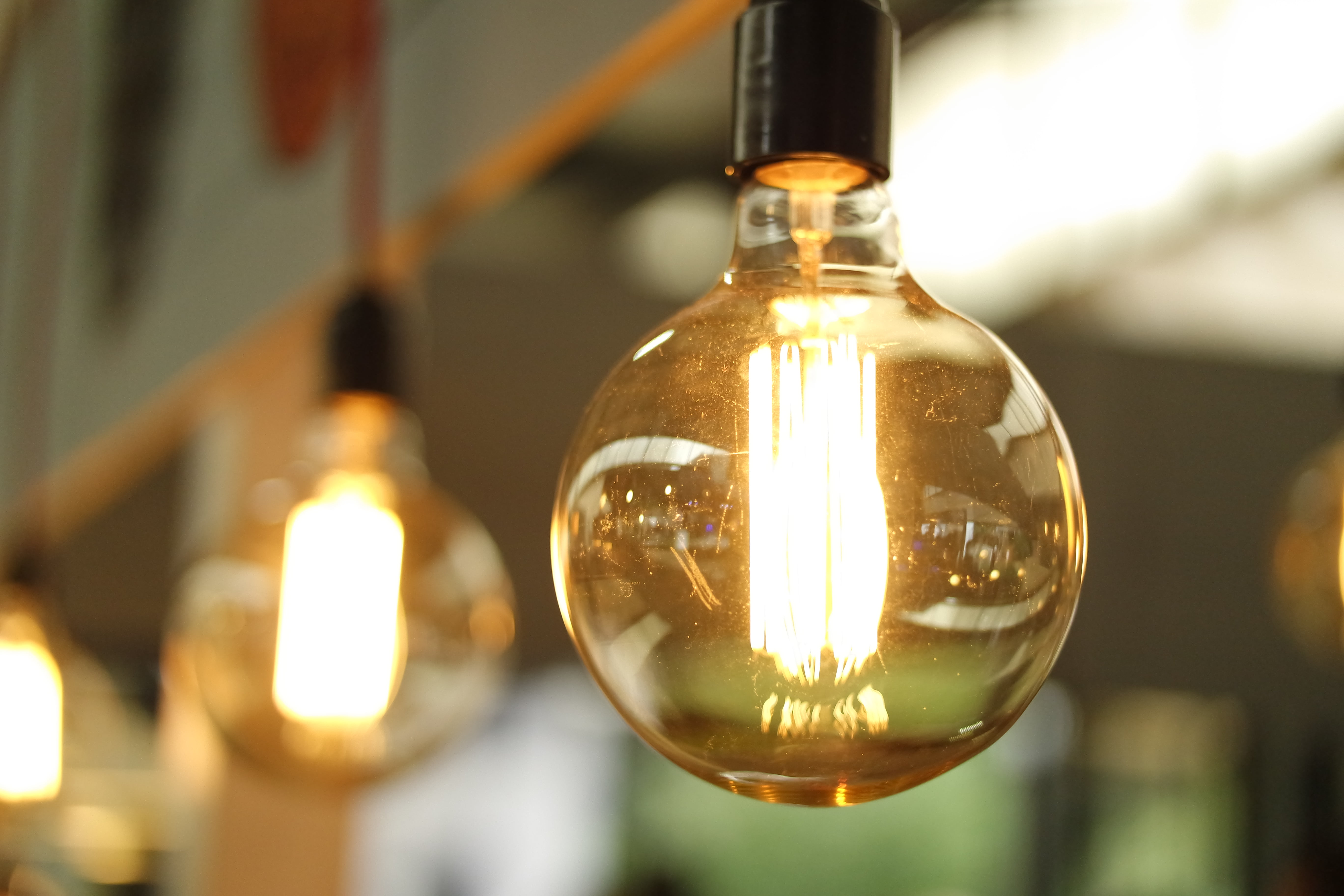focus on foreground, led, fixtures, electricity, glass, brown, hanging, no people, light bulb, filament, 5K, electric light, glass - material, lights, HD Wallpaper