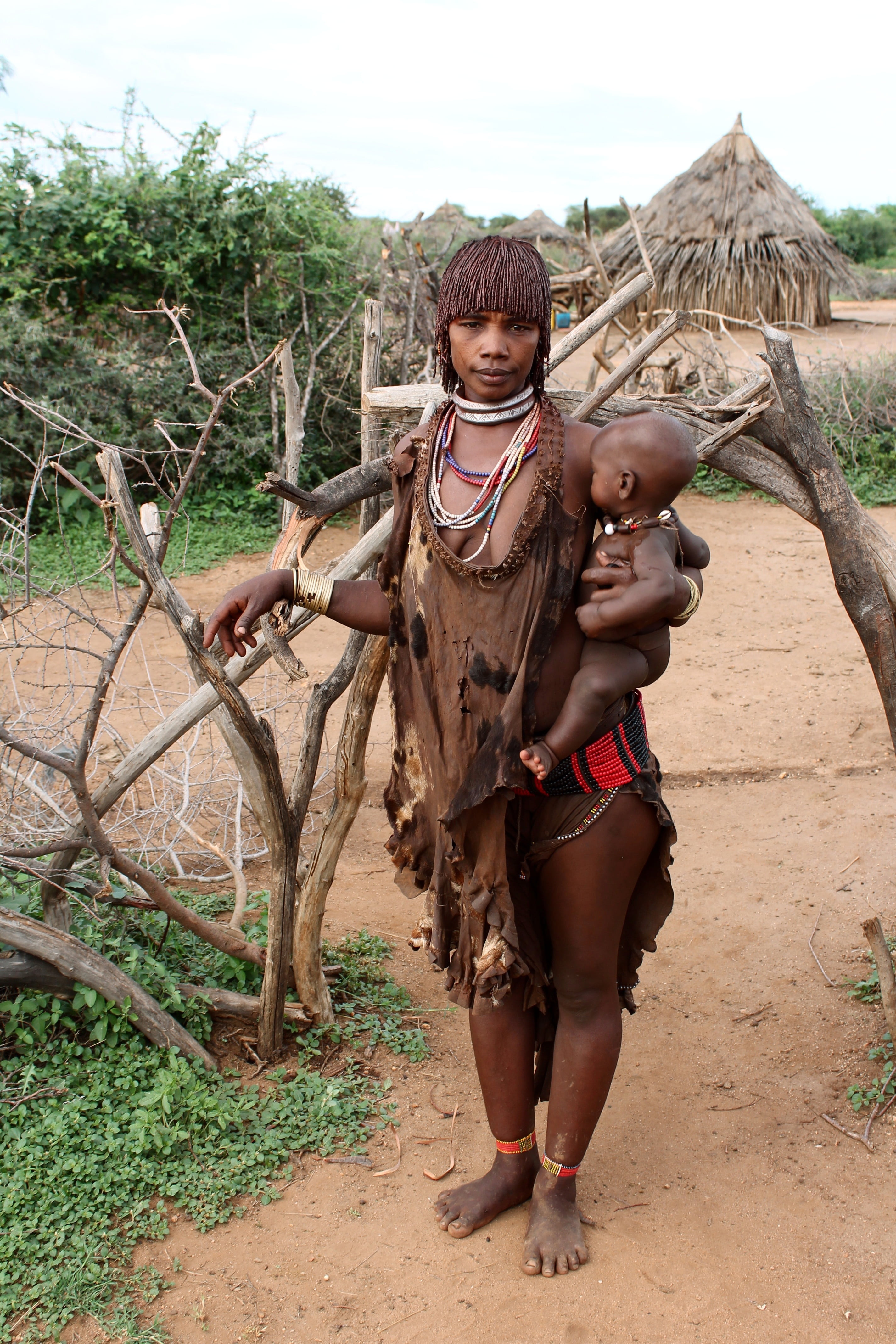 lifestyles, field, people, smiling, black skin, outdoors, real people, males, one person, herbivorous, hamar, land, looking at camera, africa, ethiopia, Phone HD Wallpaper