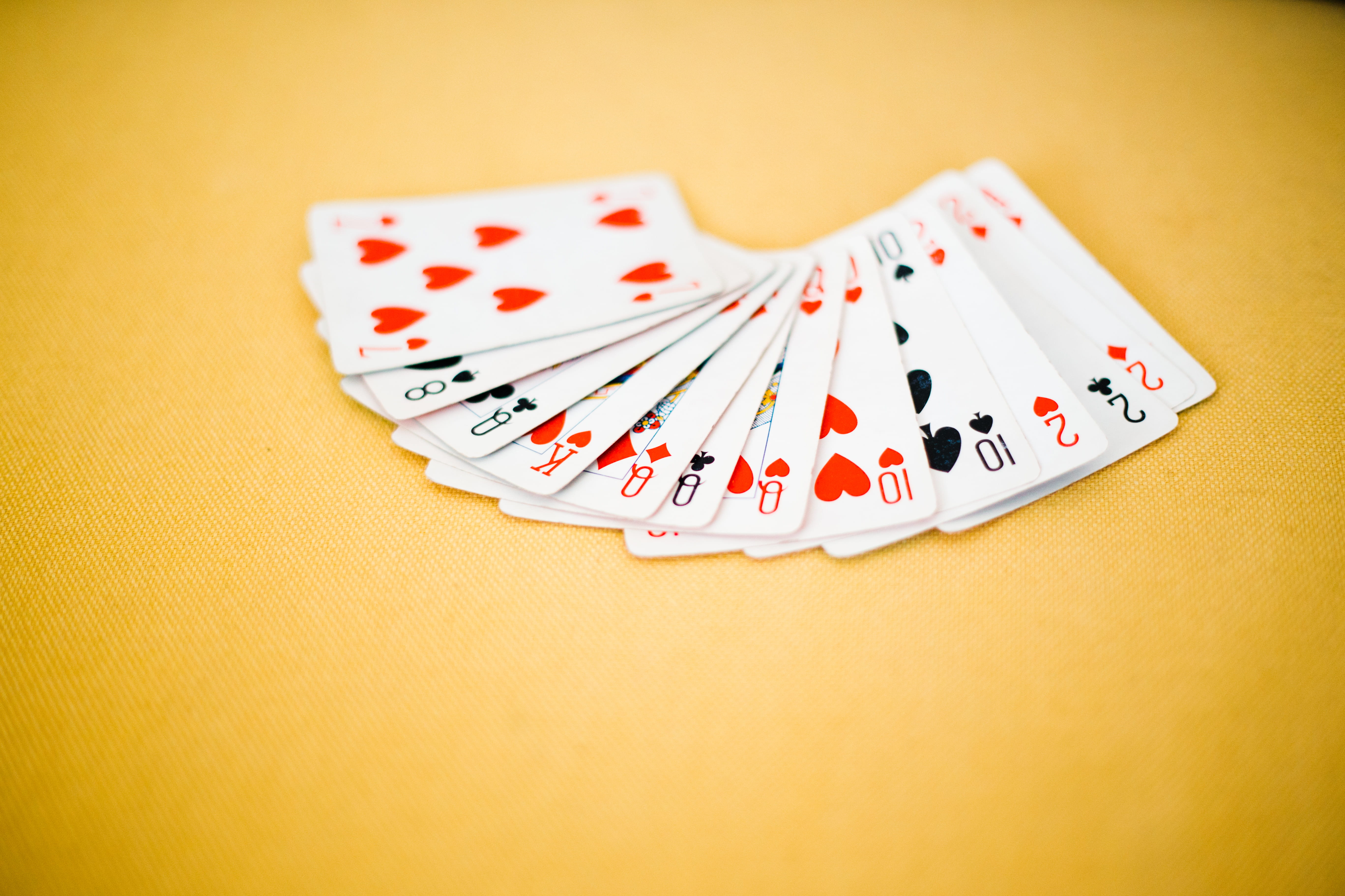 play, leisure, yellow, playing cards, table, game, number, close-up, colored background, spade, yellow background, red, risk, white color, no people, card game, HD Wallpaper