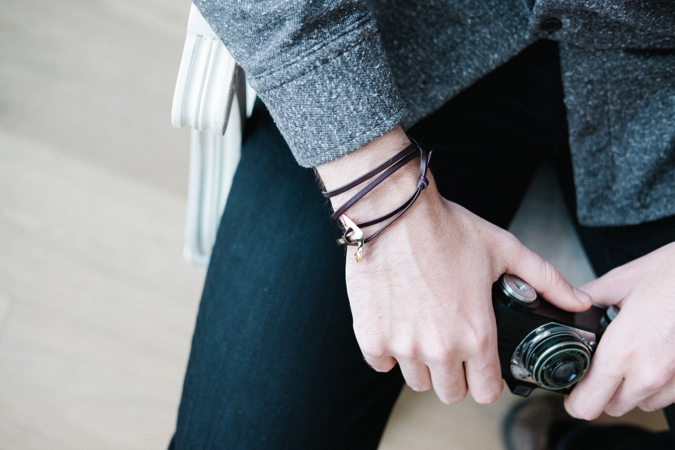 focus on foreground, one person, Accessories, outdoors, lifestyles, Leather, adult, close-up, midsection, day, holding, men, fashion, Bracelet, 1080P, HD Wallpaper