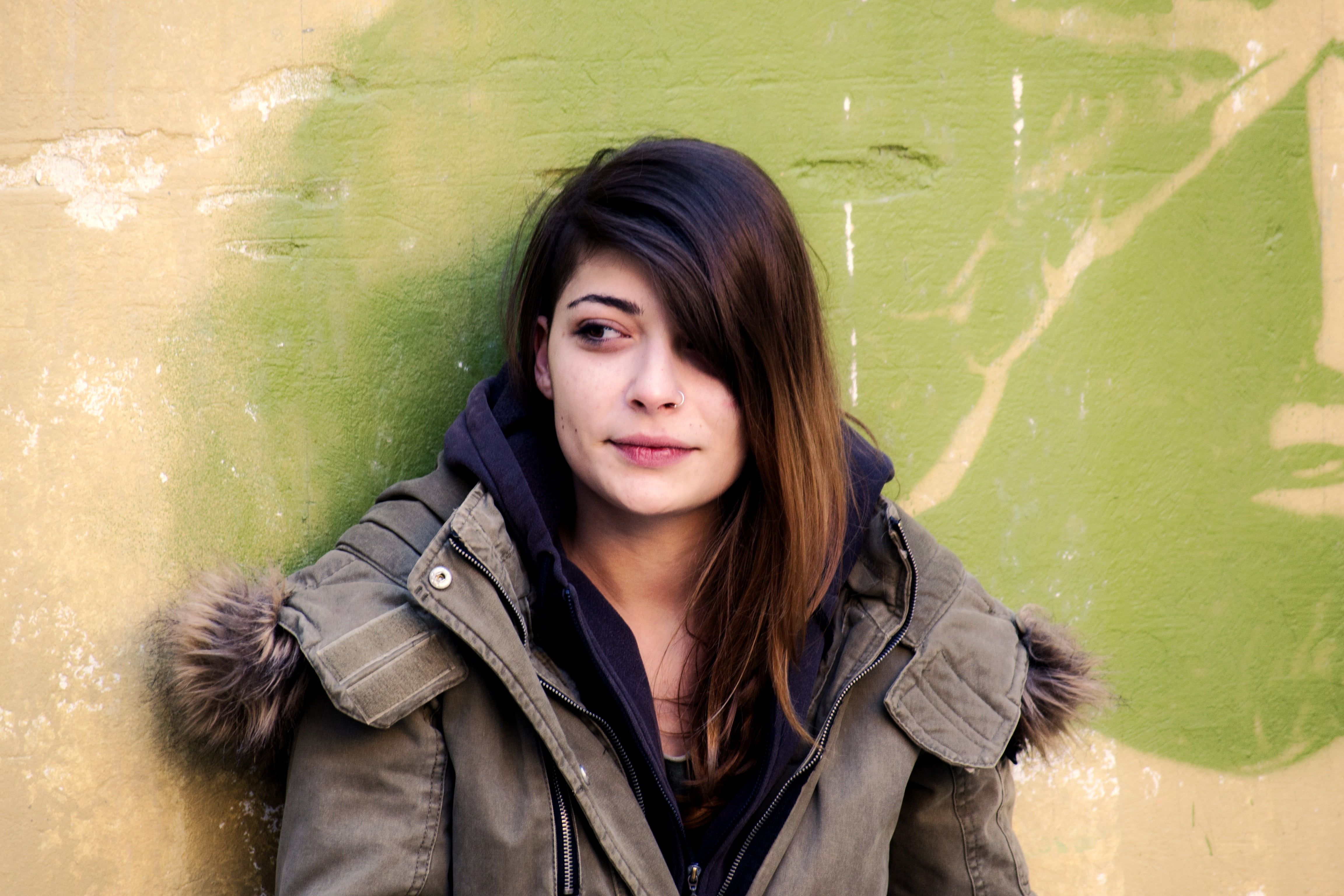 headshot, trendy, outdoors, leaning, white, gray, front view, standing, parka, casual, beauty, real people, looking at camera, model, jacket, wall, girl, HD Wallpaper