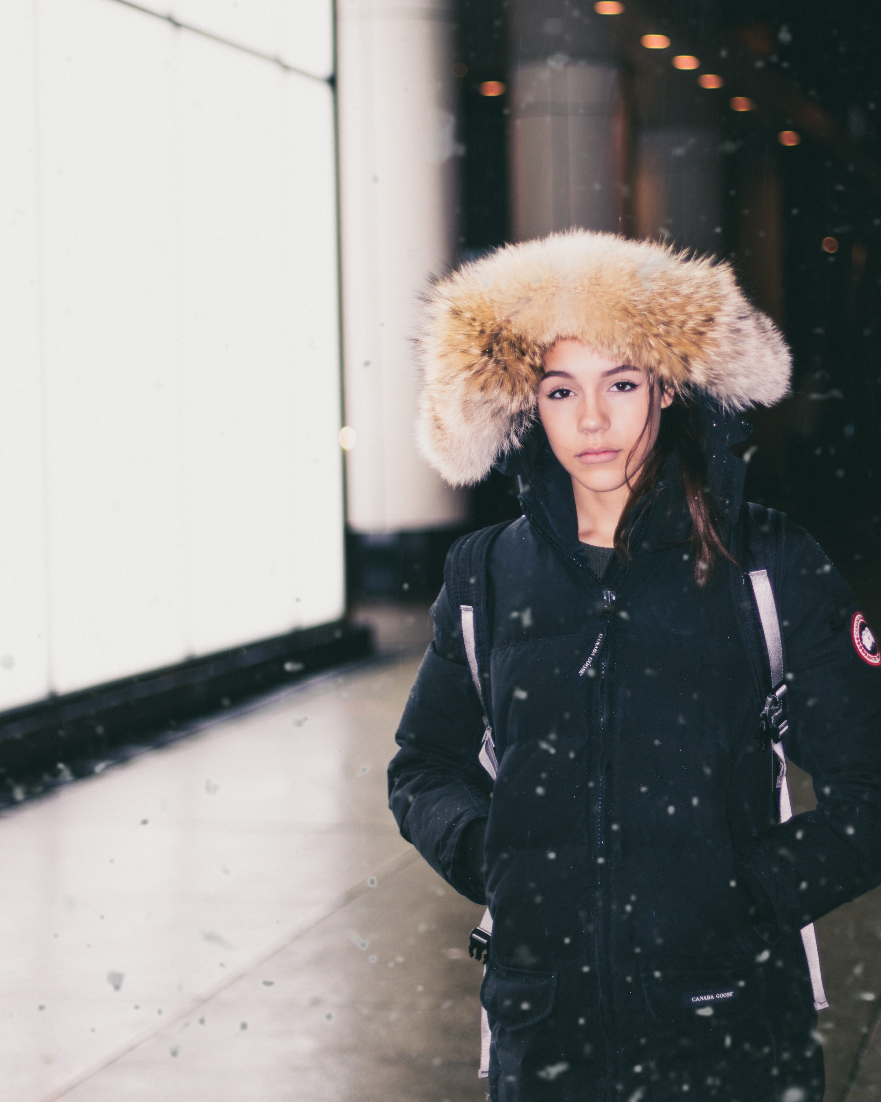 clothing, young women, fashion, women, outdoors, adult, fur hat, snowing, cold - Temperature, people, beautiful woman, coat, 2K, waist up, urban Scene, Phone HD Wallpaper