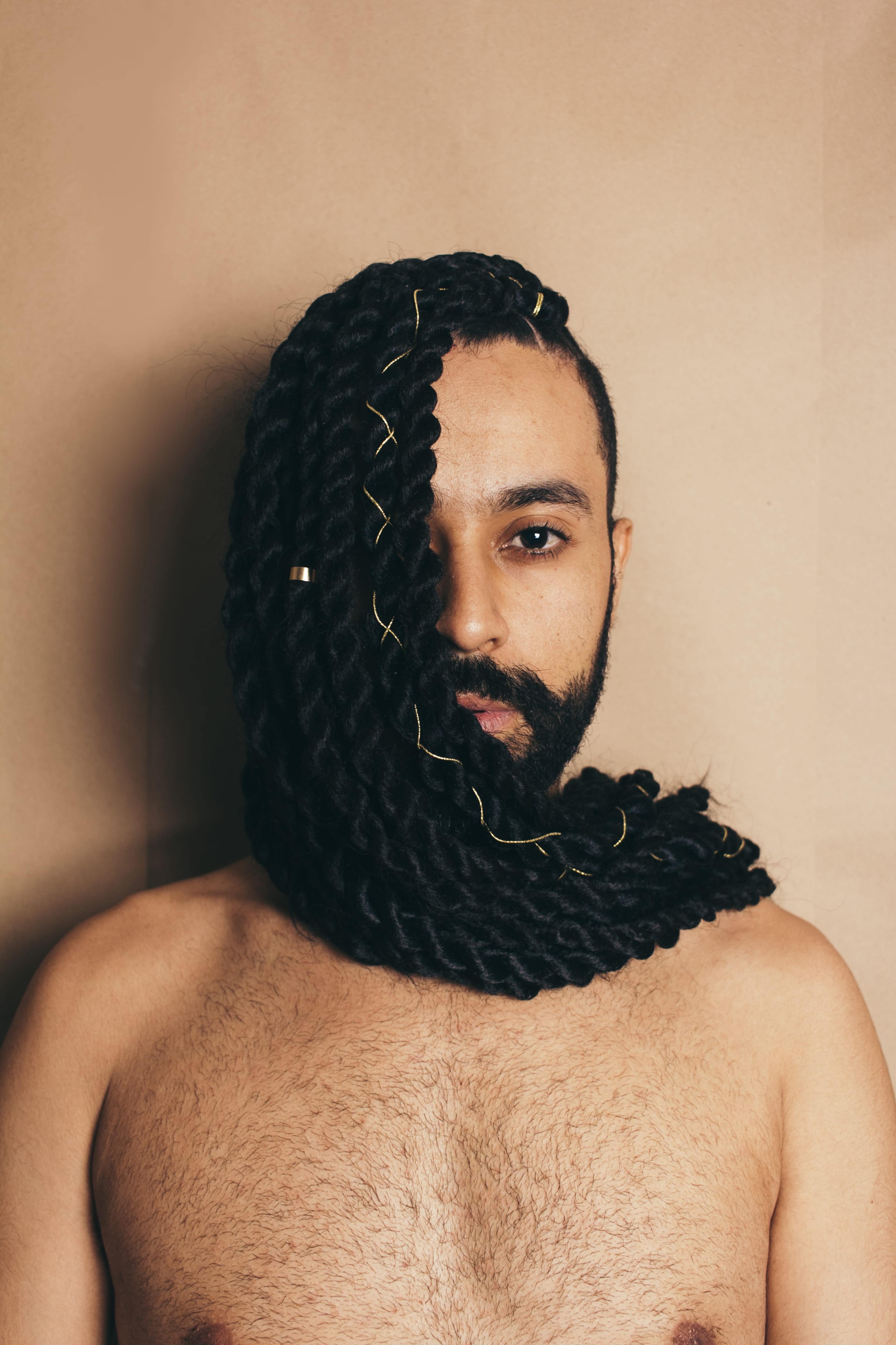 one person, indoors, model, fine-looking, facial hair, men, studio shot, braided, looking at camera, human hair, shirtless, wall - building feature, front view, Phone HD Wallpaper