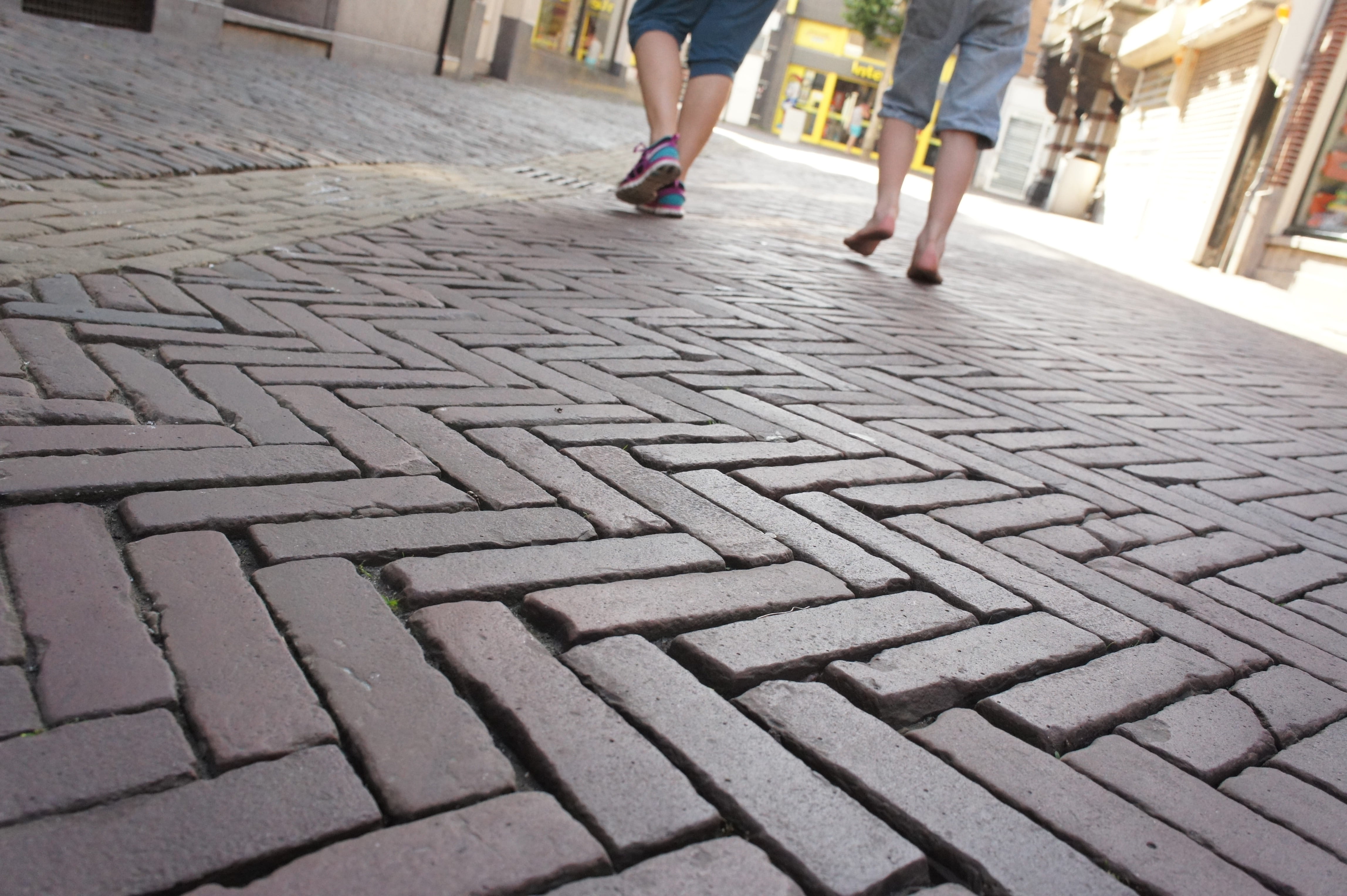 human limb, holland, architecture, herringbone, surface level, motion, outdoors, people, City, road, lifestyles, day, low section, pattern, body part, Summer, HD Wallpaper
