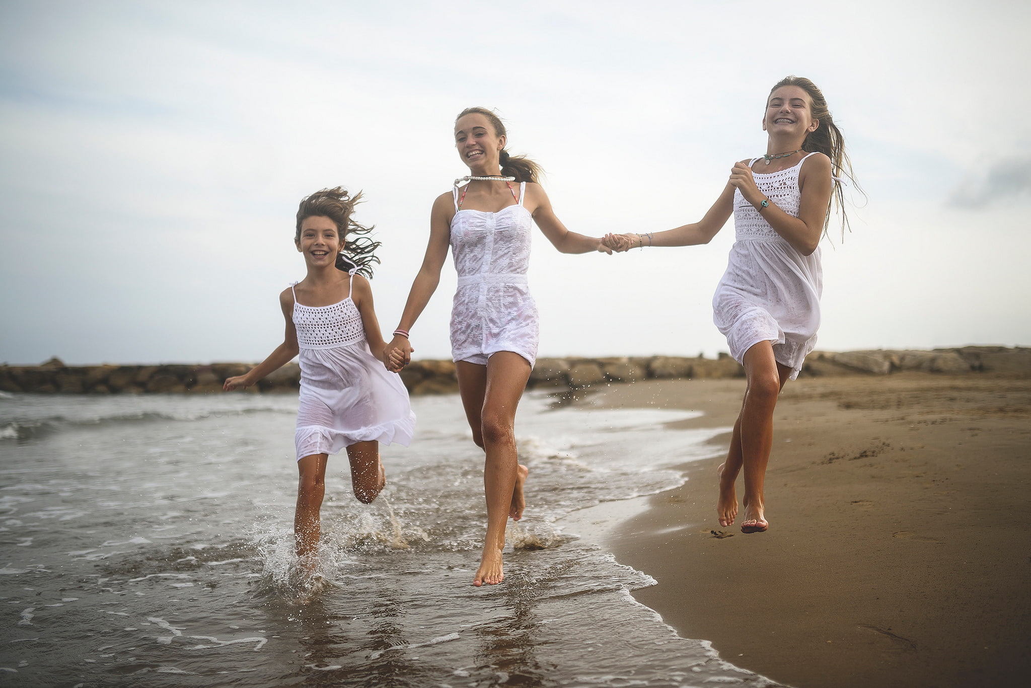 white, beach, shore, positive emotion, girls, bonding, childhood, togetherness, women, outdoors, sea, leisure activity, fun, dress, emotion, freedom, sky, HD Wallpaper