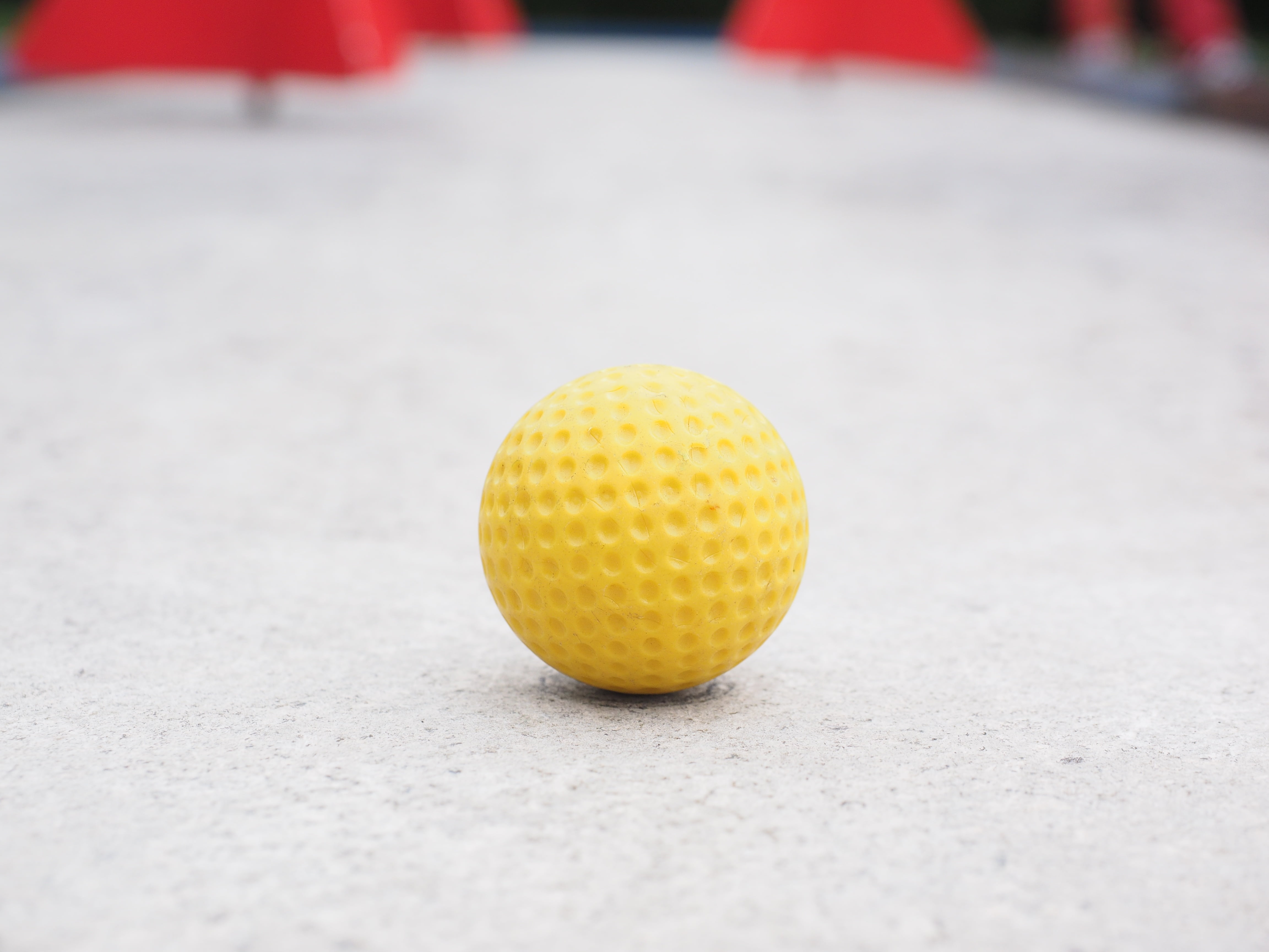 golf Course, eternit track, train, ground golf, 4K, outdoors, ball, single object, mini golf ball, putting, competition, obstacles, rubber ball, selective focus, HD Wallpaper
