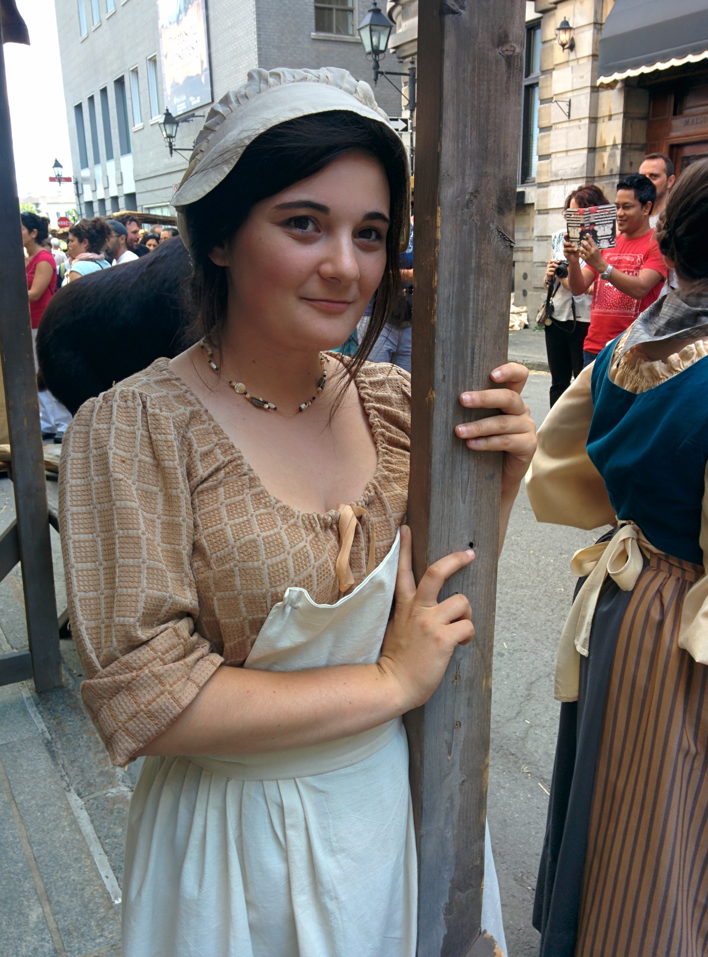 2K, pointe-à-callière, people, clothing, traditional clothing, three quarter length, smiling, market, naturalists, standing, day, hairstyle, real people, Phone HD Wallpaper