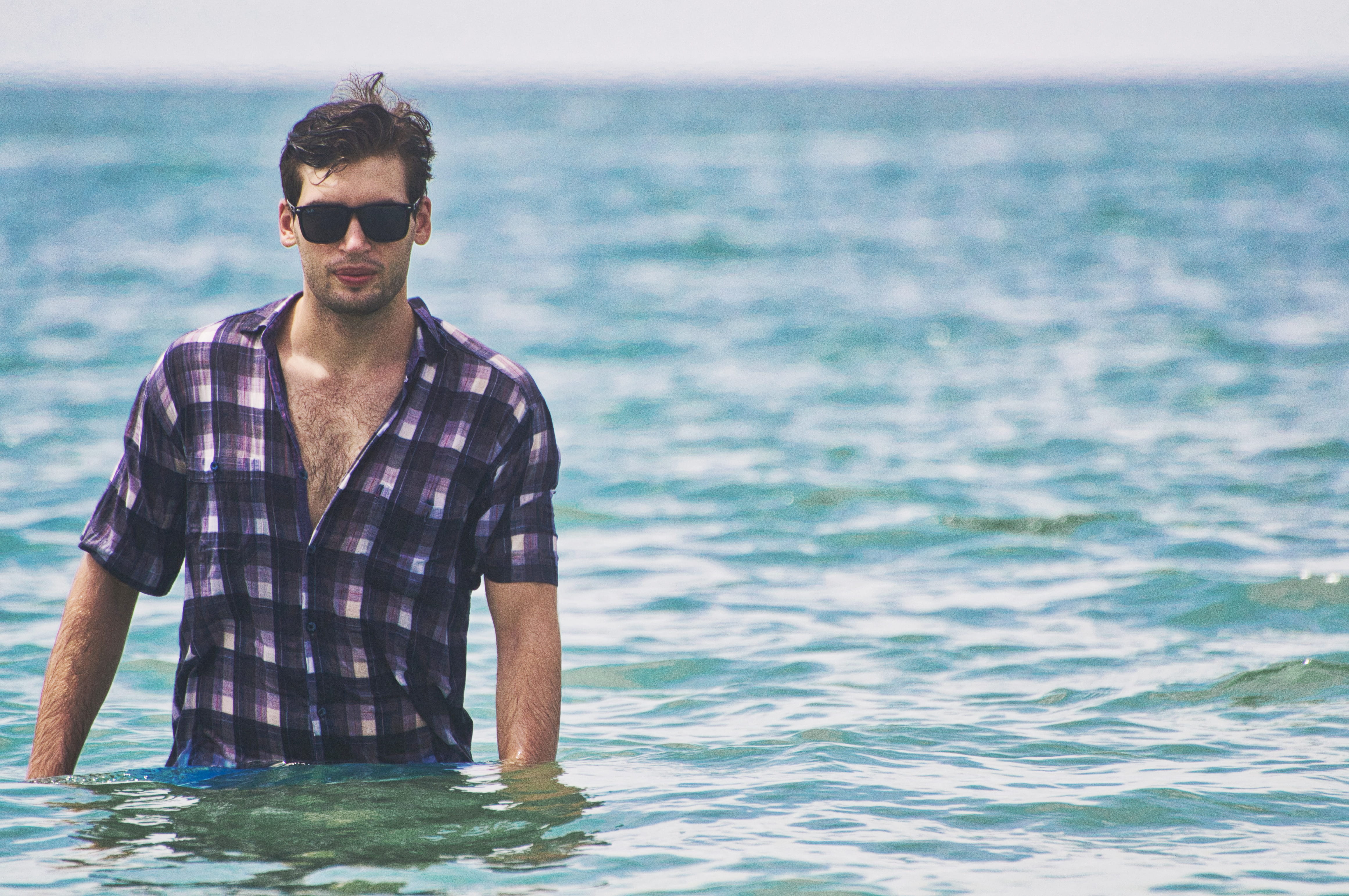 young adult, horizon, gingham, holiday, casual clothing, swim, male, sea, sunglasses, outdoors, body, shirt, daytime, white, blue, purple, standing, wade, HD Wallpaper