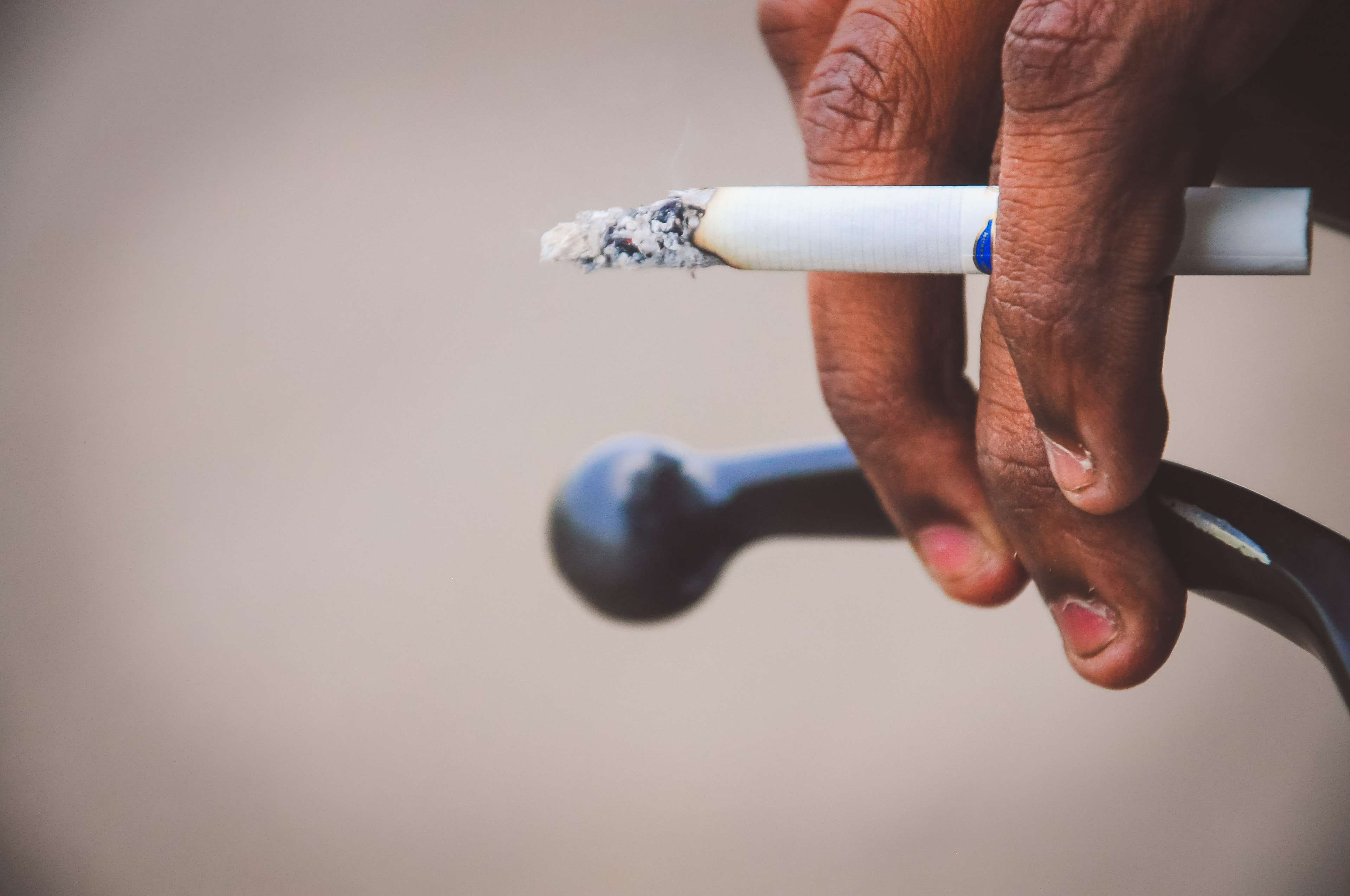 low section, closeup, sign, indoors, cigerate, smoke, human limb, one person, 4K, lifestyles, smoking issues, ciger, cigarette, hand, cancer, white, human body part, HD Wallpaper