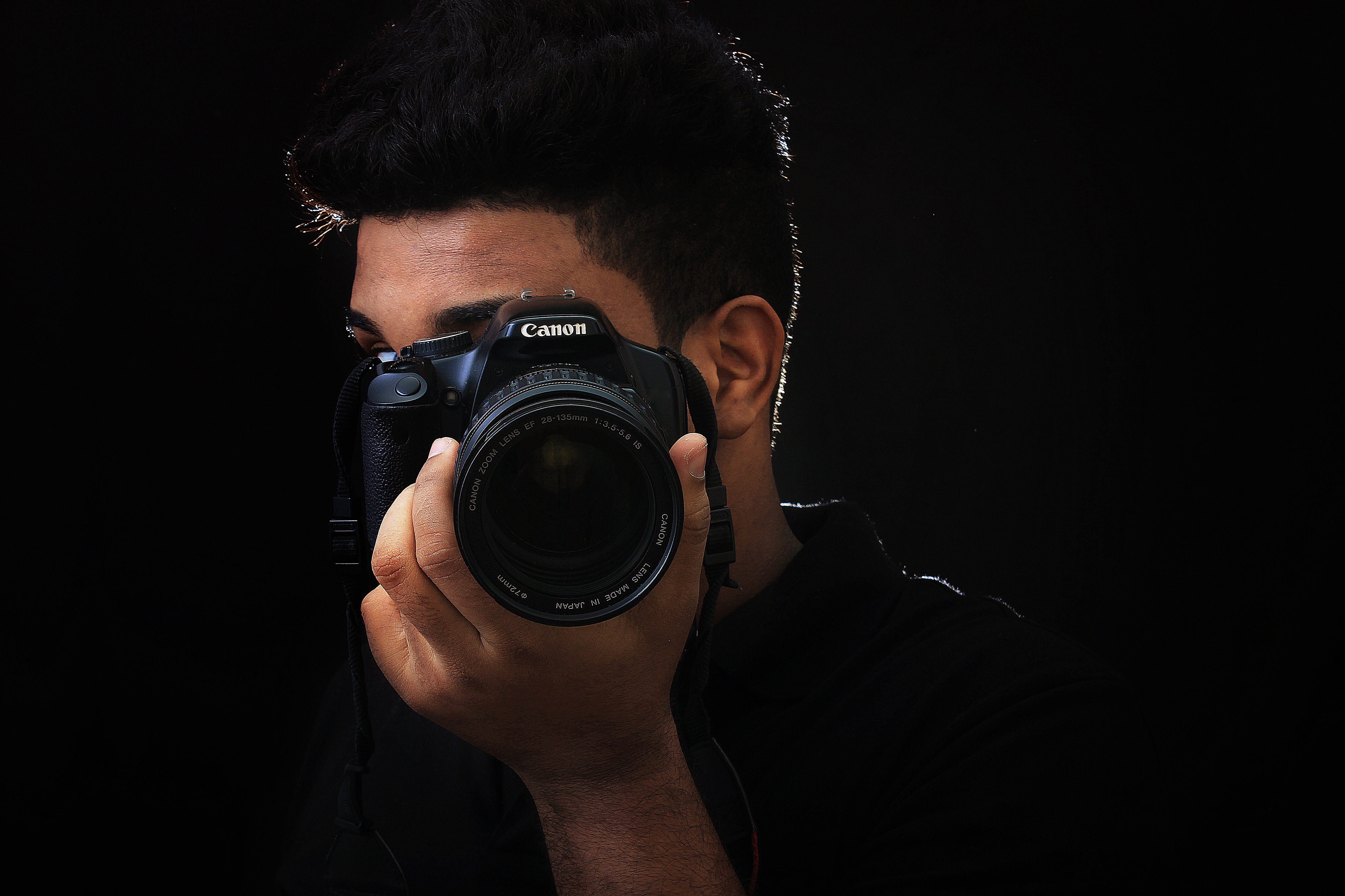 headshot, photographic Equipment, photographers, caucasian Ethnicity, activity, photo shoot, notebook, black background, photography, people, Canon, hobbies, HD Wallpaper