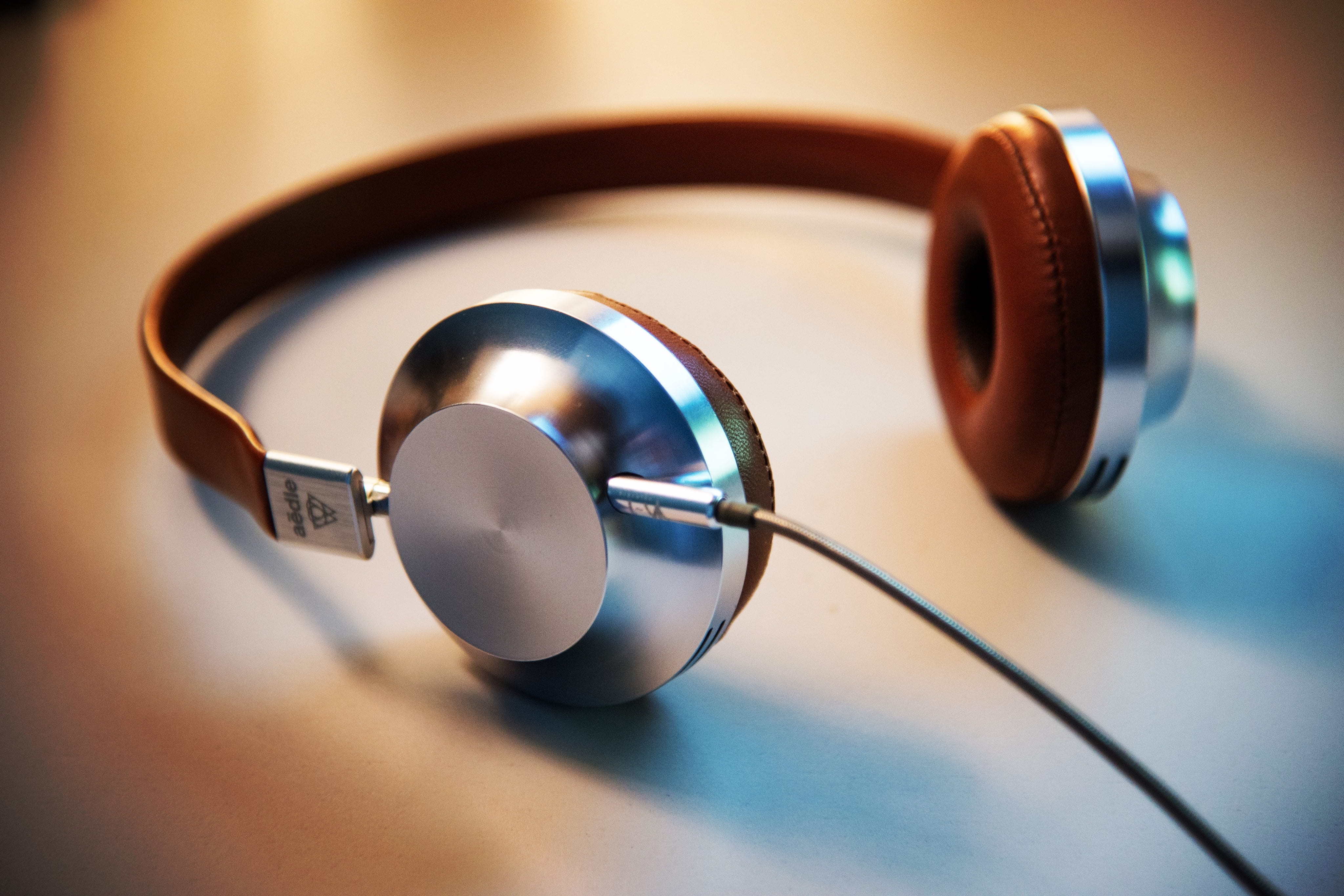 no people, song, studio shot, business, close-up, single object, technology, still life, 4K, focus on foreground, table, earphones, gray, backgrounds, HD Wallpaper