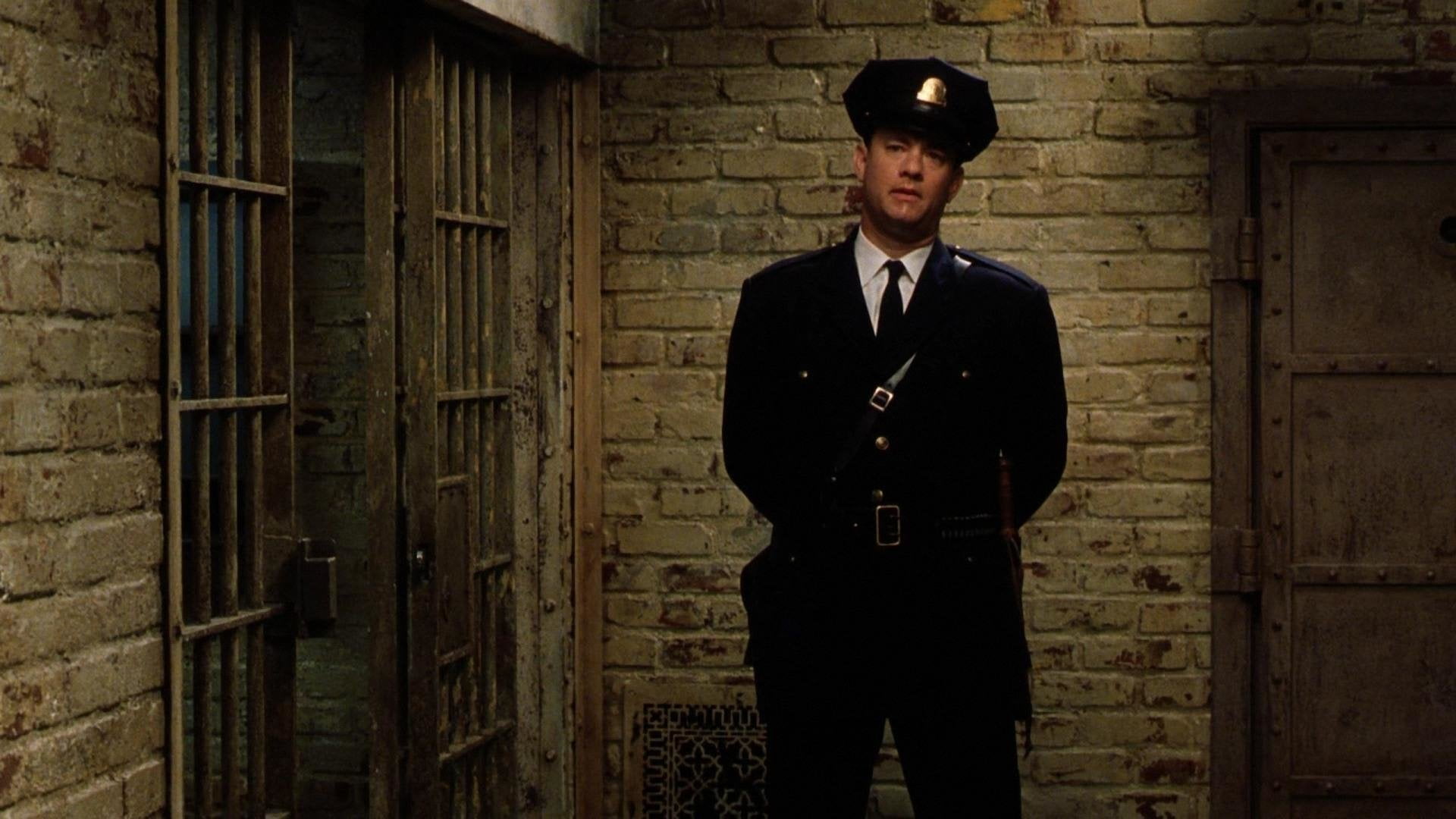 Tom Hanks, well-dressed, 1080P, formalwear, brick wall, brick, young men, uniform, men, menswear, wall - building feature, wall, hands in pockets, built structure, HD Wallpaper
