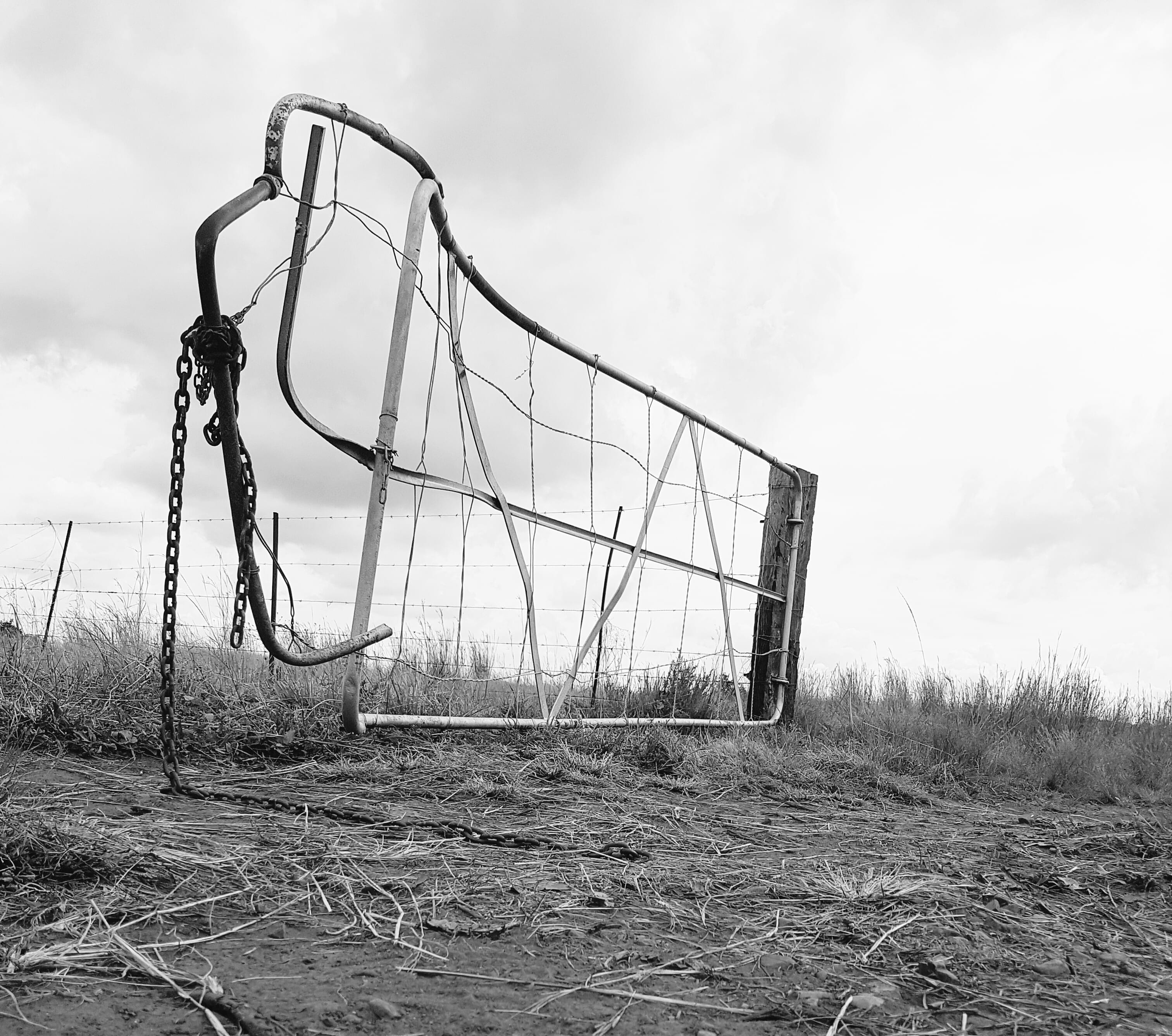 landscape, damaged, grass, steel, fence, playground, absence, monochrome, land, expression, sky, outdoors, outdoor play equipment, photo, empty, wire, grayscale, HD Wallpaper