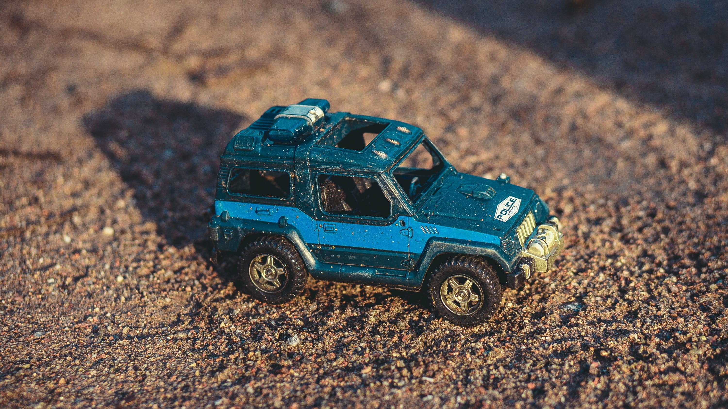 toy car, outdoors, cop, nature, police, land, field, 2K, play, land vehicle, plying, broken, mode of transportation, toy, blue, miniature, crime, kids, HD Wallpaper