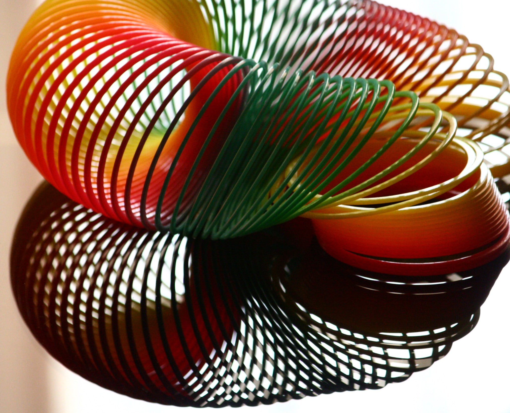 circle, 1080P, reflection, red, multicolored, toy, abstract, SOE, shiny, spring, curve, spiral, HD Wallpaper