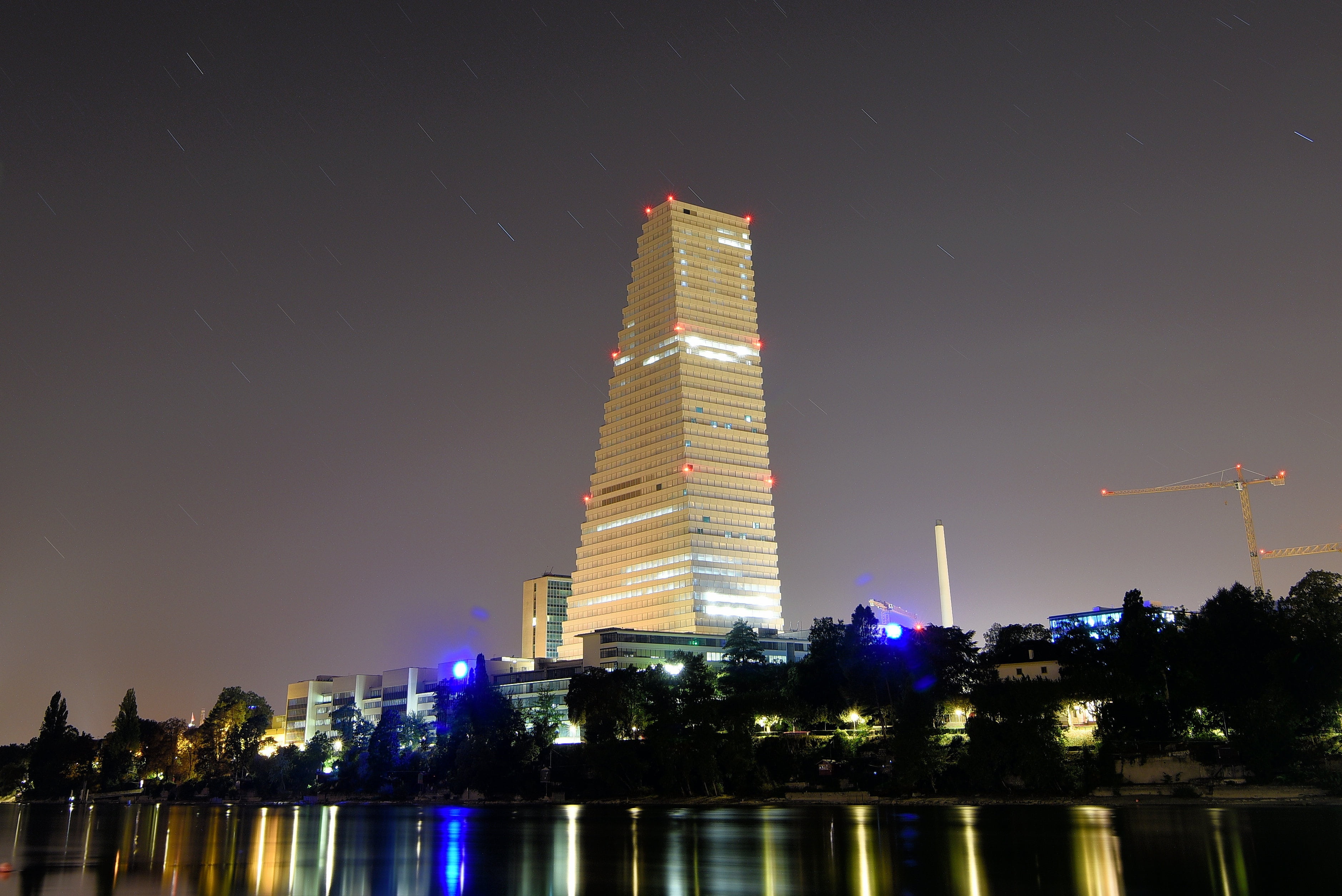 tall - high, travel destinations, financial district, skyscraper, basel, building, illuminated, buildings, modern, water, sky, city, building exterior, HD Wallpaper