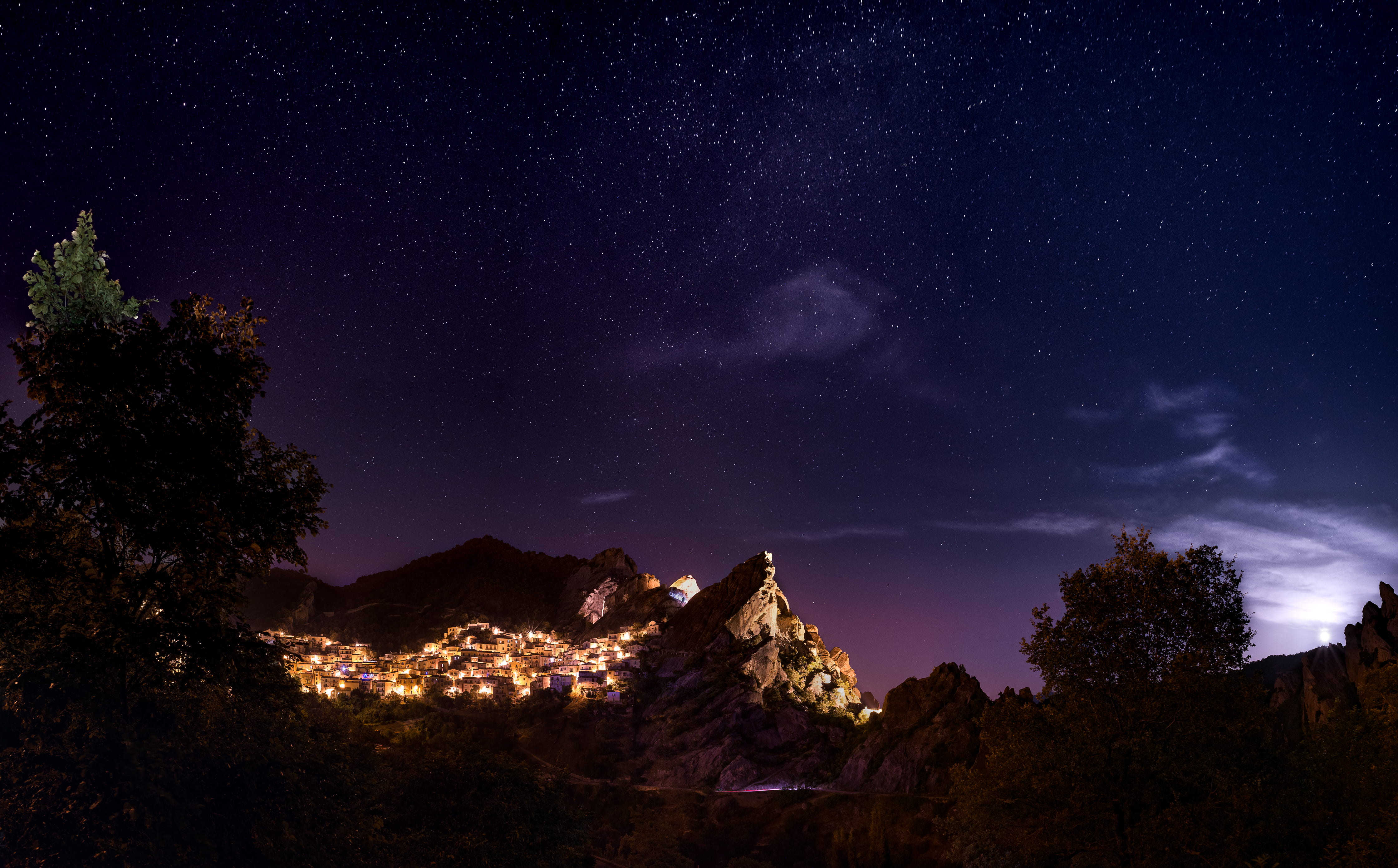 galaxy, mountain, 4K, castelmezzano, nighttime, outdoor, plant, star - space, moonlight, tree, dark, outdoors, light, milky way, moon, travel, lights, HD Wallpaper